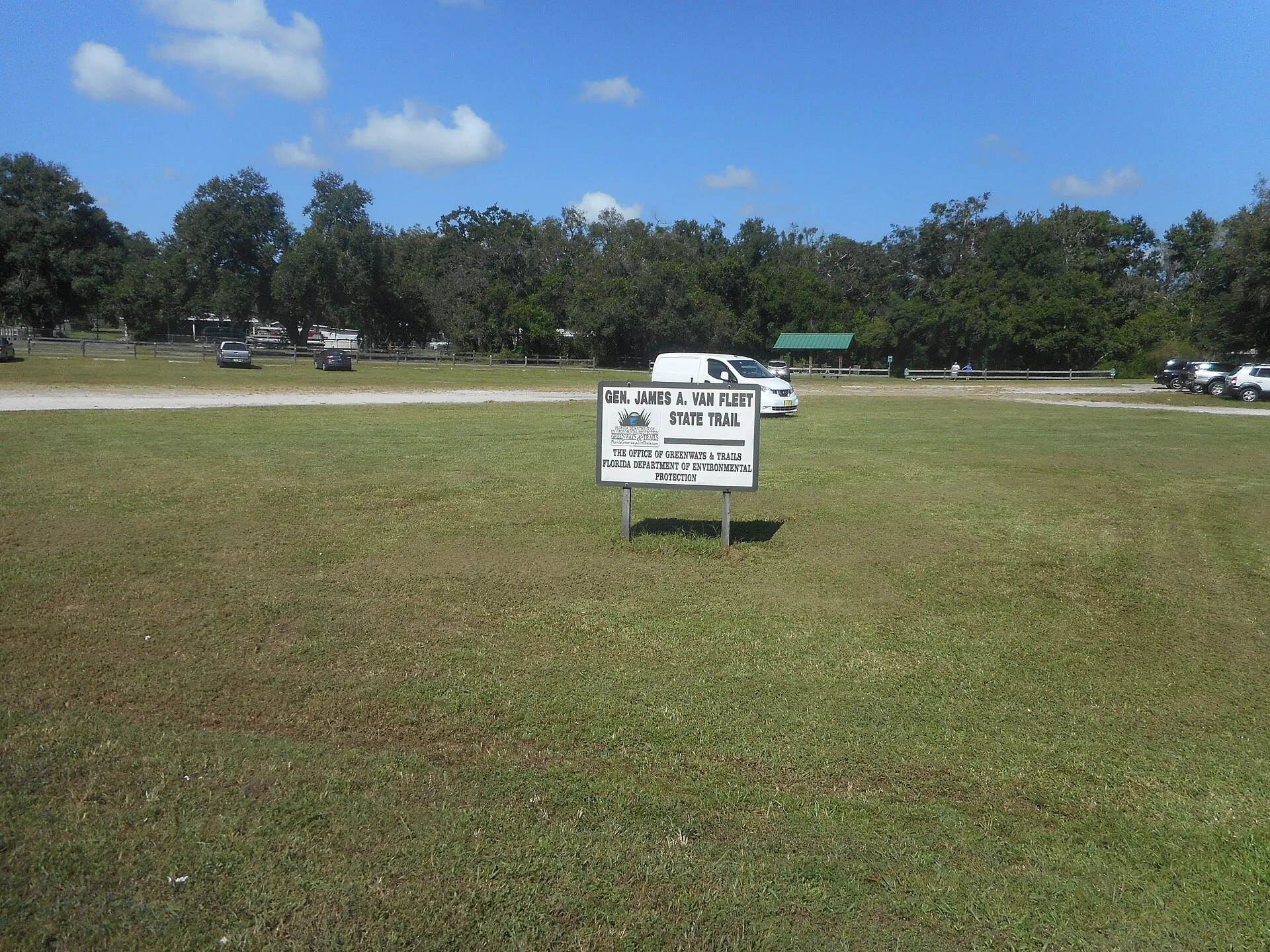 Sign at the Polk City trailhead of the General James A. Van Fleet State Trail, shared by the Auburndale TECO Trail
