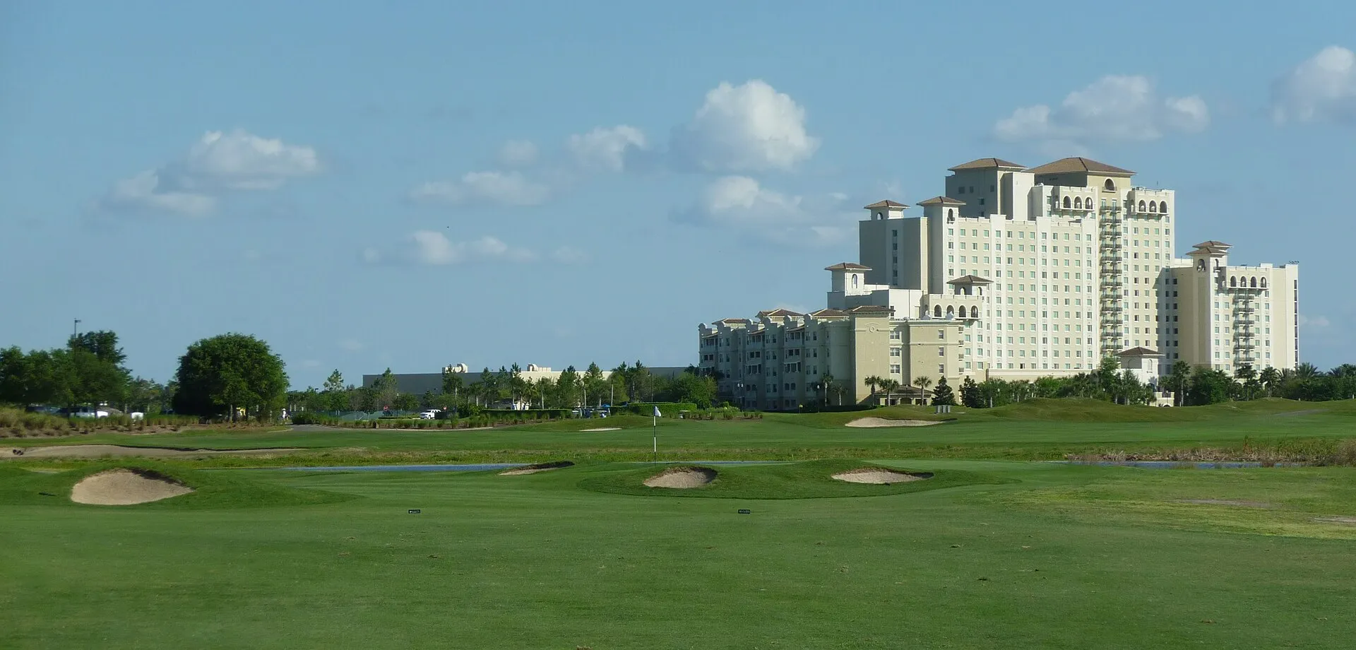 The 18th hole of the ChampionsGate International golf course and the Omni Orlando Resort
