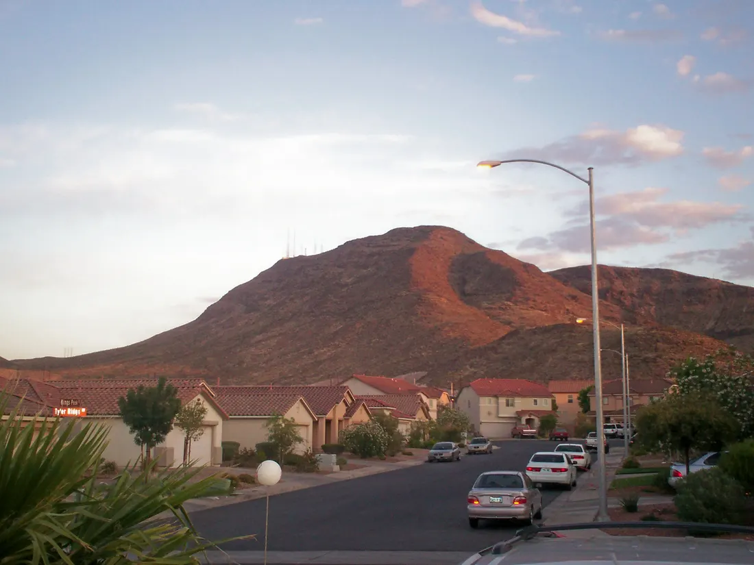 A view of "Black Mountain" above Henderson, Nevada. While not the actual Black Mountain, which lies a little South, this unnammed mountain is one of the more prominent of those in the Mccullough Range and its peak is the site of much of the radio and television transmission towers for the Las Vegas
