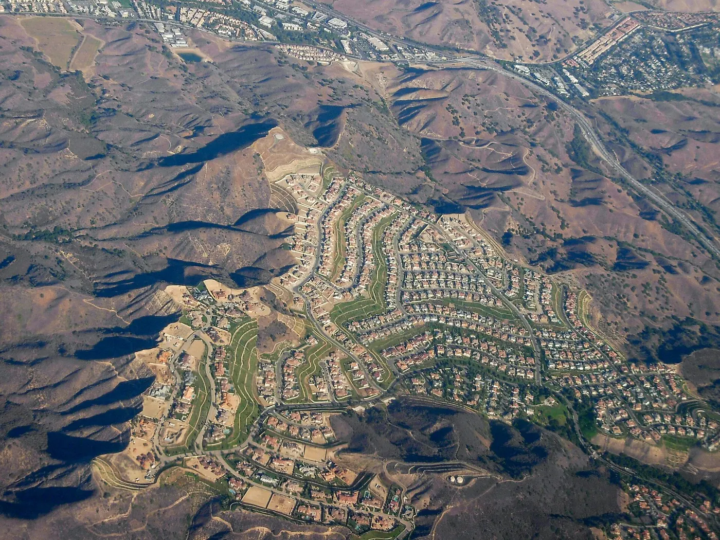 Aerial view of Calabasas, California and the intersection of Las Virgenes and U.S. Route 101, facing northwest