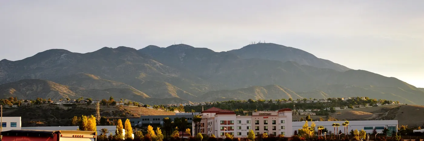 Saddleback as seen from Lake Forest, California, U.S.A., with some Foothill Ranch commercial buildings and Portola Hills homes in the foreground. Both Foothill Ranch and Portola Hills technically belo.