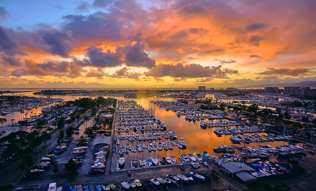 Sunset over the Marina del Rey harbor and its docks.
