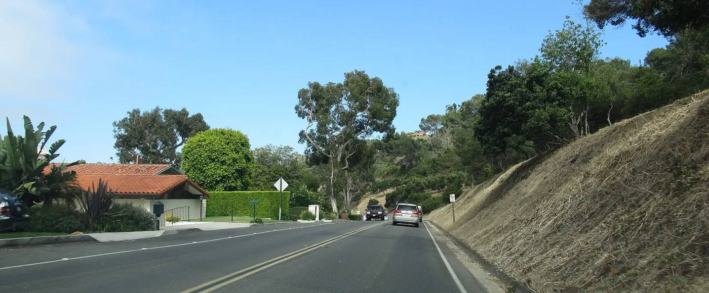 Residential street with hillside homes in Palos Verdes Estates