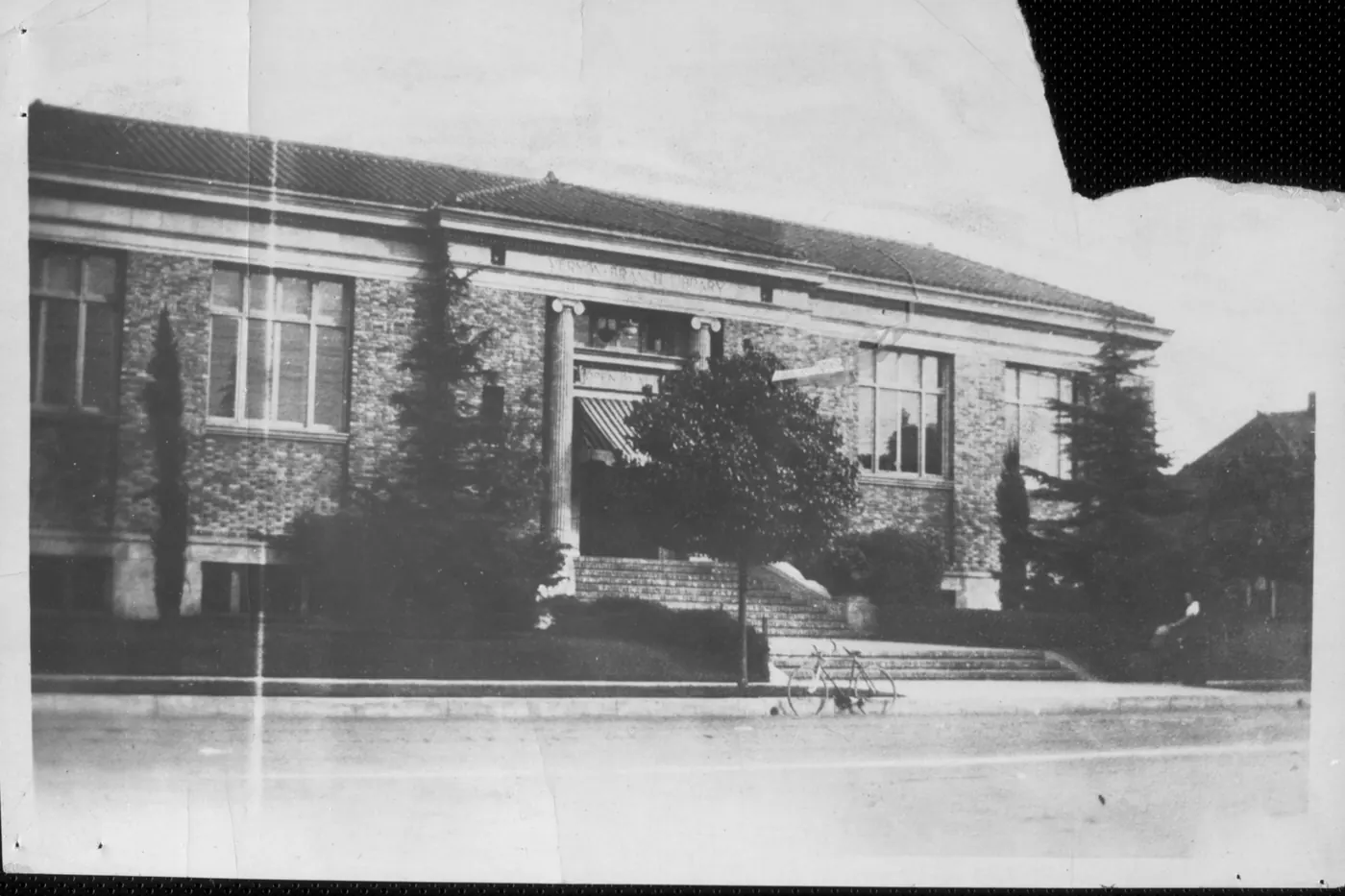 A front view of the Vernon Library from the street Front facade view of the Vernon Library, from Central Avenue in Vernon, Los Angeles County, California. Streetscape. Horizontal photography