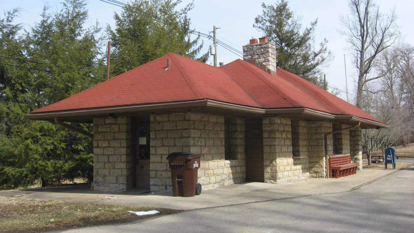 Roadside view of the Glenview post office, located at 4330 Glenview Avenue in Glenview, Kentucky, United States. A former train station built in 1887, it is part of the Country Estates of River Road, a historic district that is listed on the National Register of Historic Places.