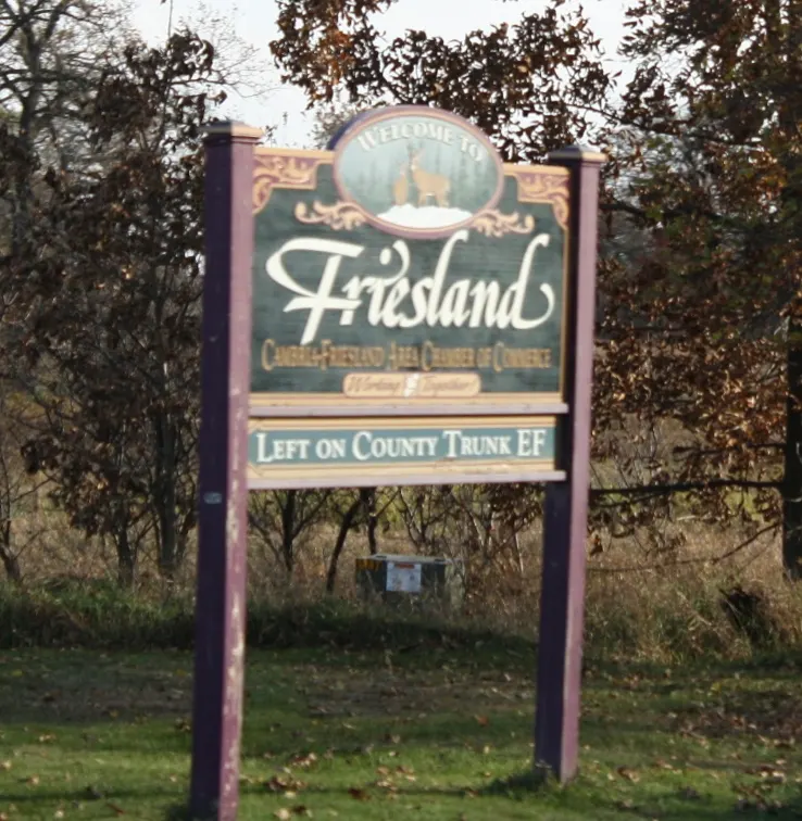 The welcome sign w:Friesland, Wisconsin along w:Wisconsin Highway 33. This file was uploaded with Commonist.