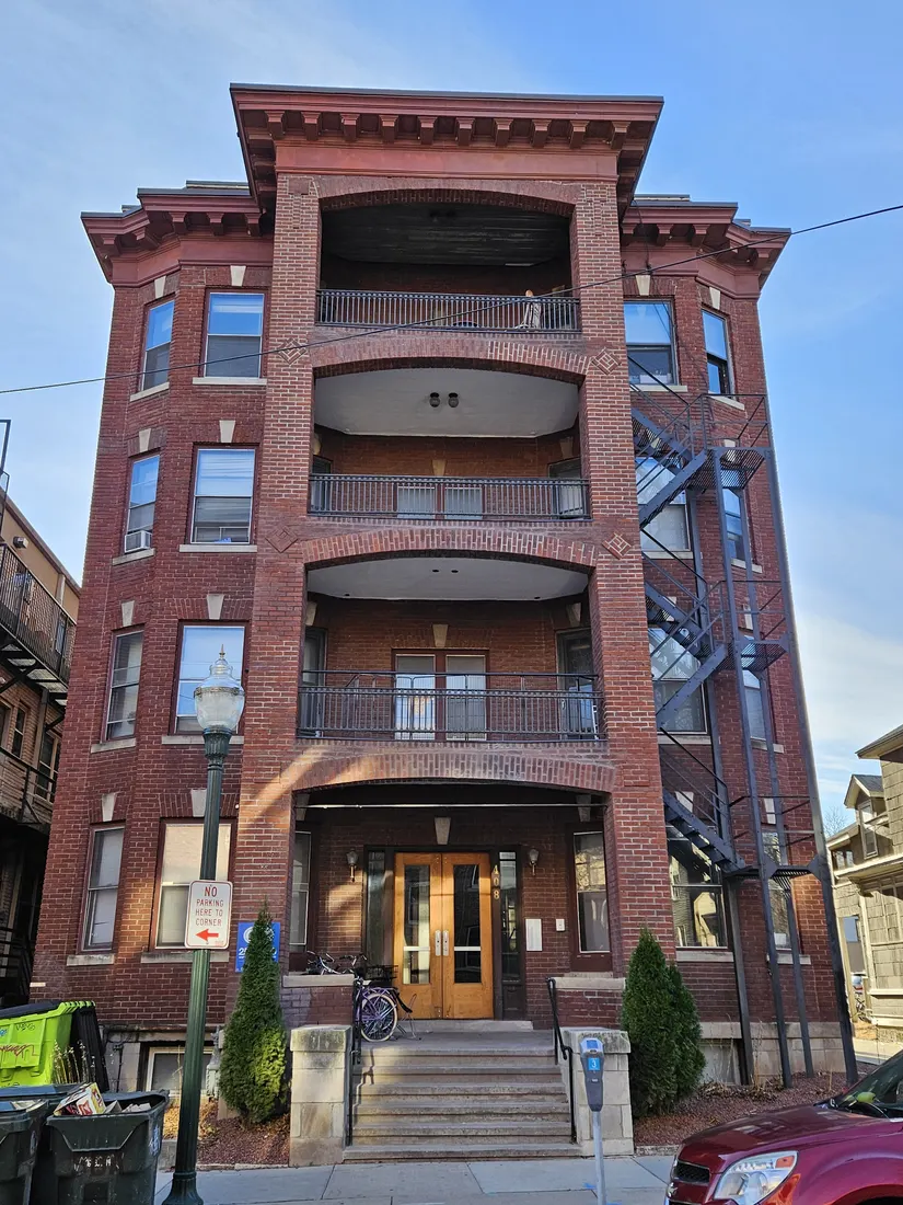 The Windsor Apartments at 408 North Henry Street in Madison, Wisconsin, were built in Classical Revival style in 1911. (See the Property Record online.) The building is a contributing structure in the Mansion Hill Historic District.