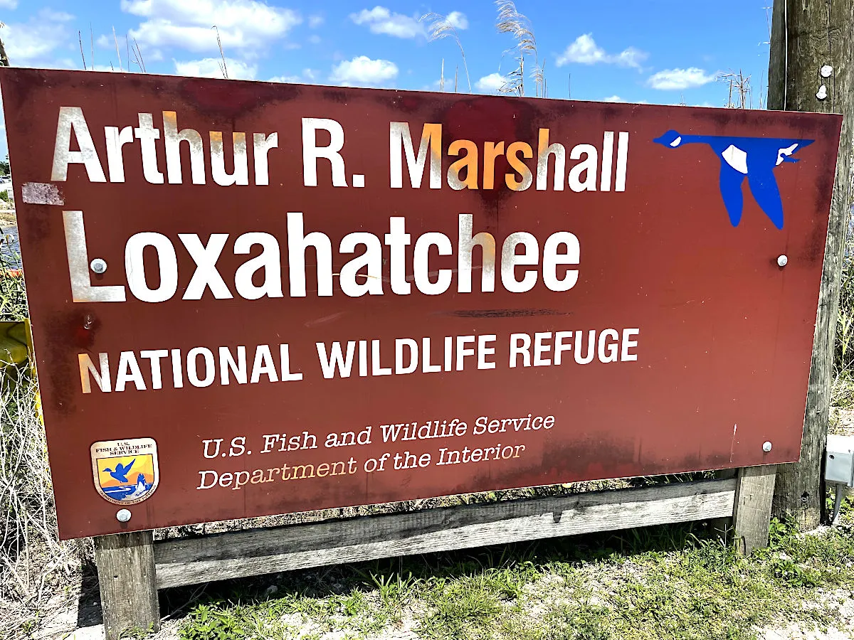 Loxahatchee National Wildlife Refuge sign at the Hillsboro Area levee trailhead.