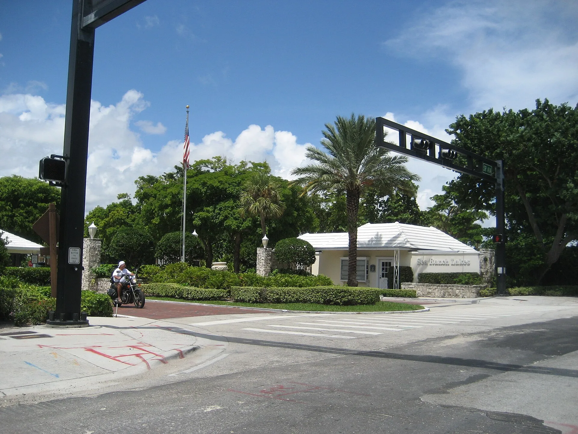 Sea Ranch Lakes, Florida — guardhouse with motorcycle, September 2007.