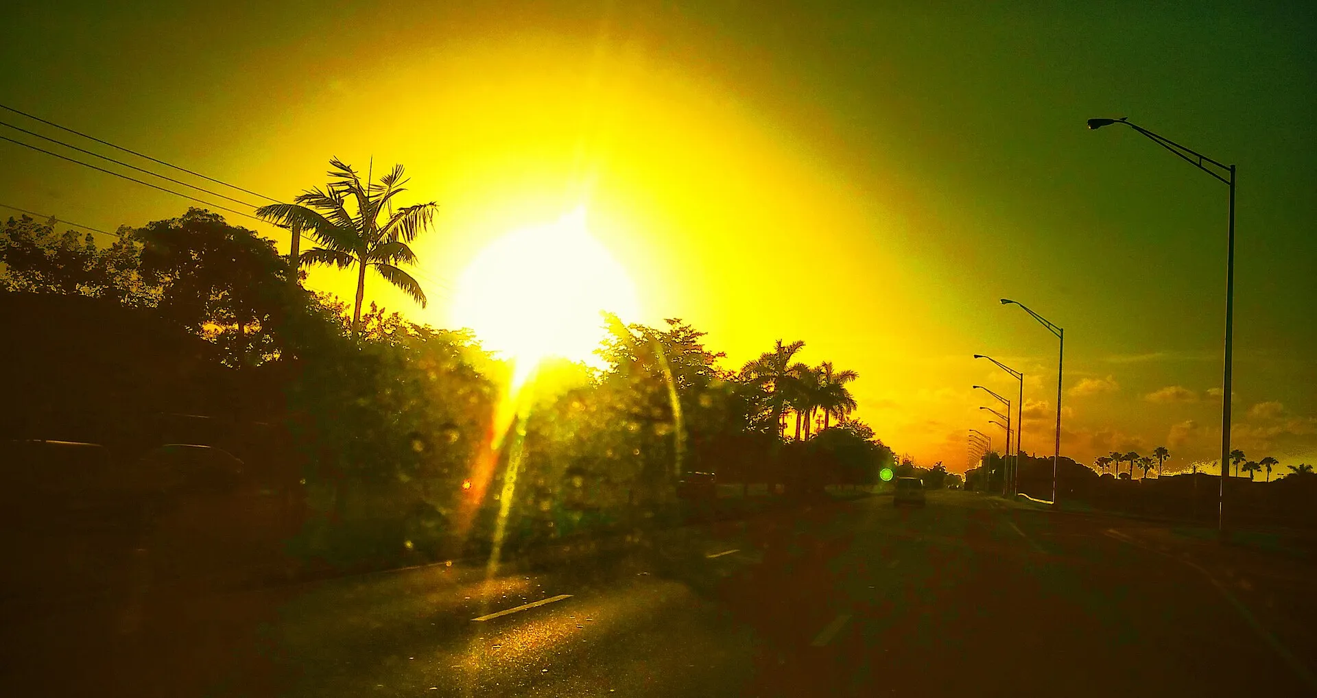 Sunrise over Kendall (photographed near The Hammocks).