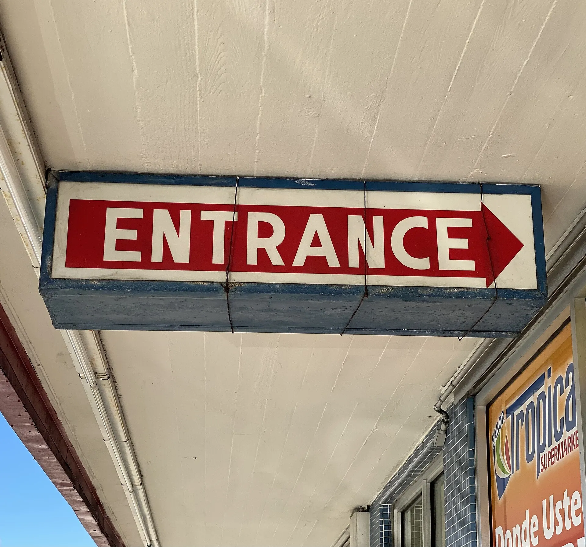 An entrance sign on a former Grand Union storefront in West Miami.