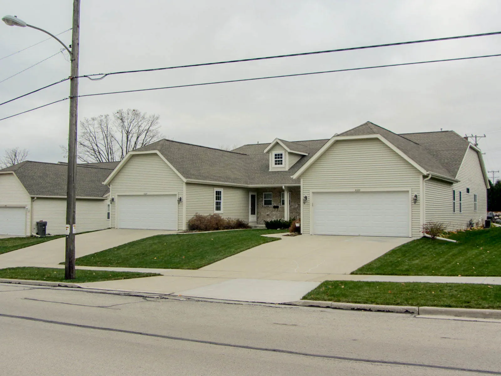 Snout houses on a residential street, Cudahy, Wisconsin (2011).