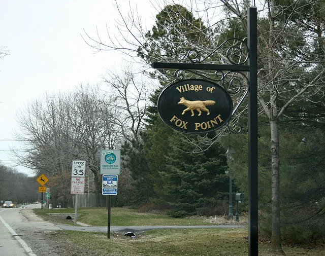 The entry to Fox Point on Lake Drive, looking north.