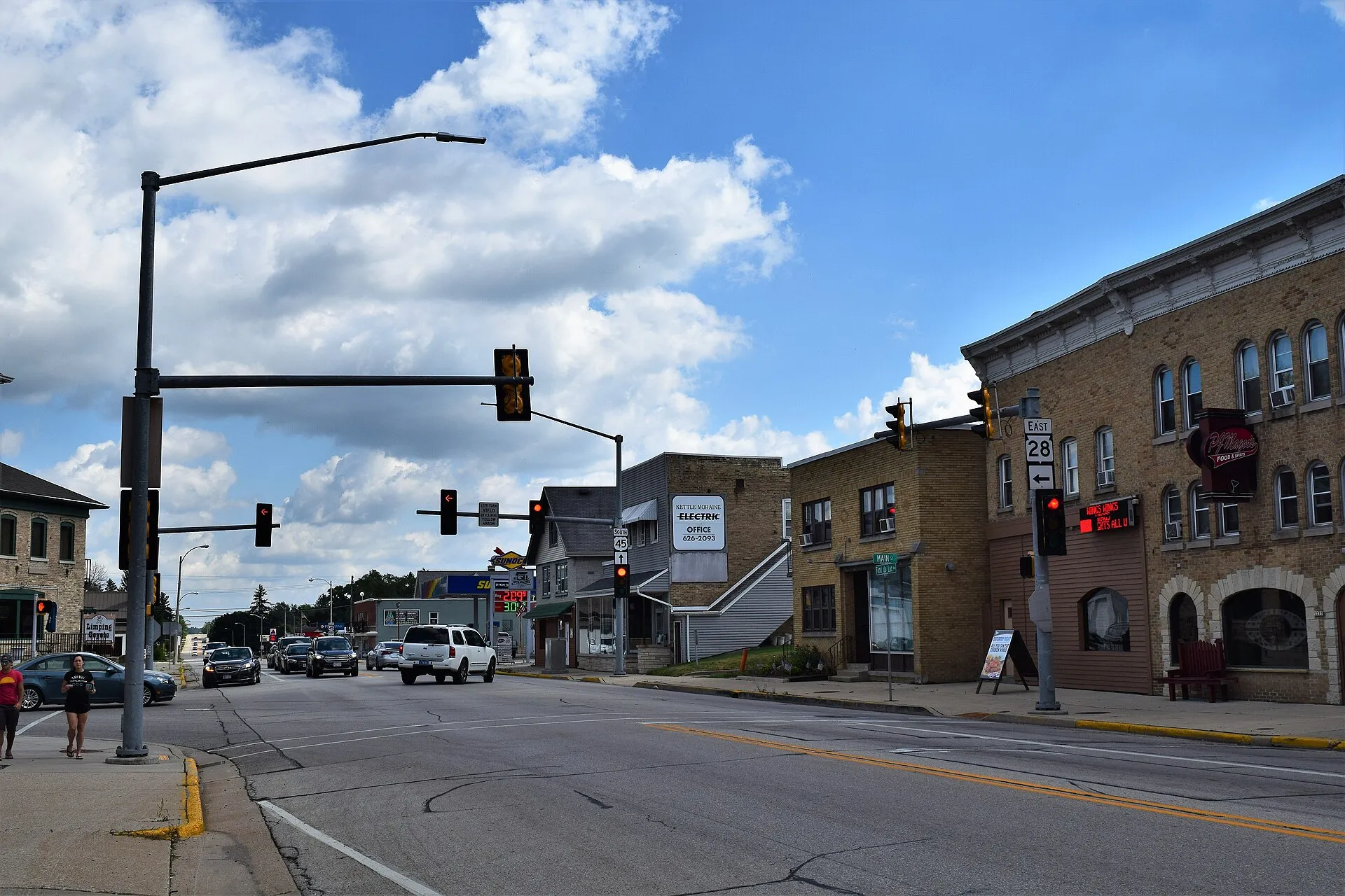 The intersection of U.S. Route 45 and Wisconsin Highway 28 in downtown Kewaskum, Wisconsin.