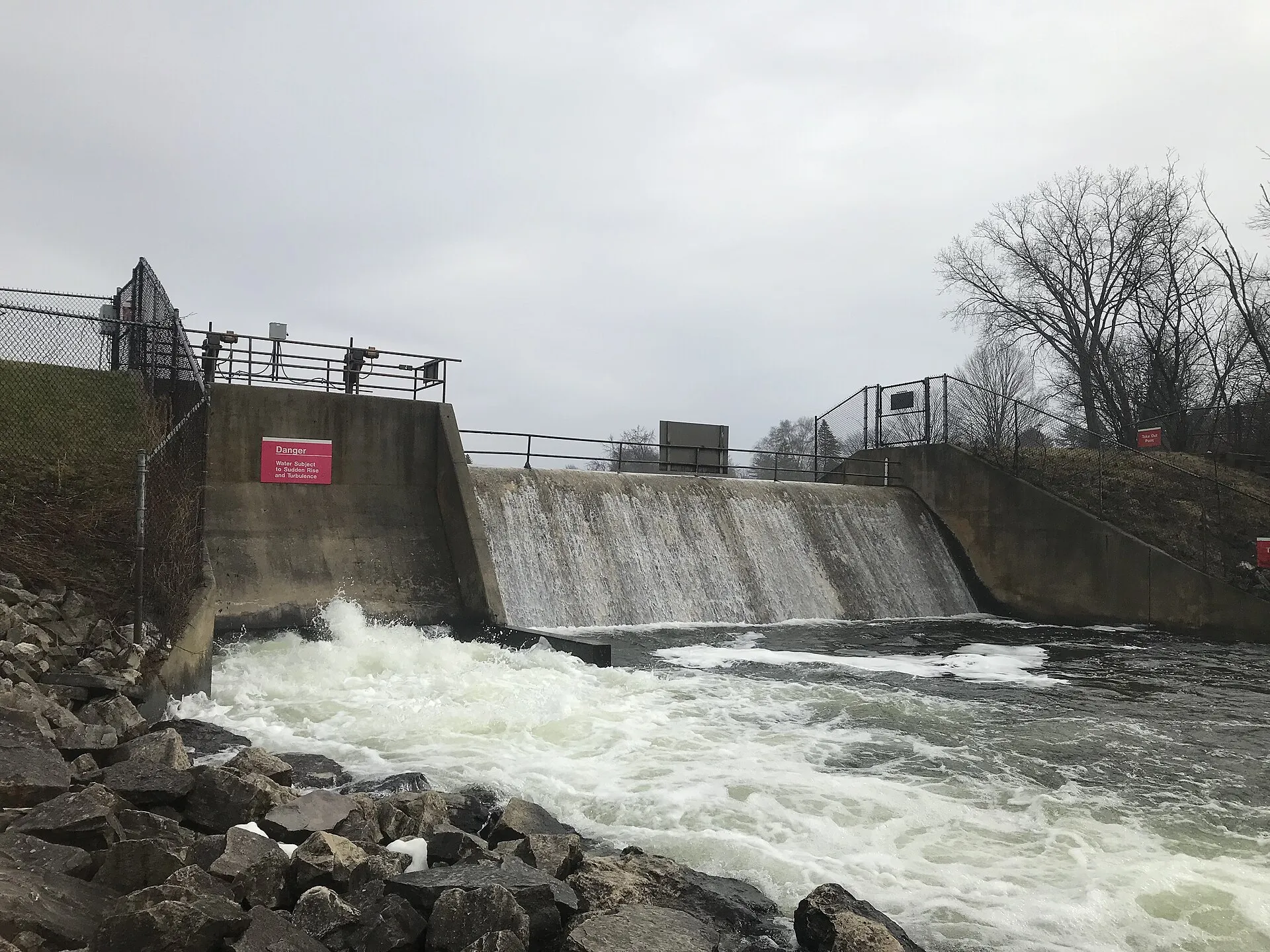 Okauchee Lake Dam on the Oconomowoc River below upper Upper Oconomowoc Lake.