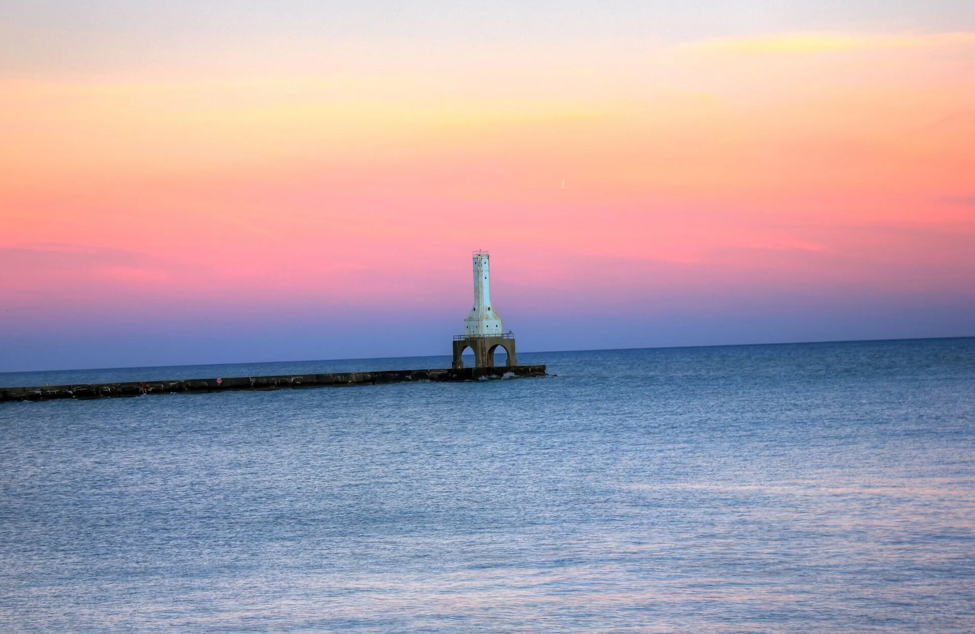 Port Washington lighthouse at dusk.