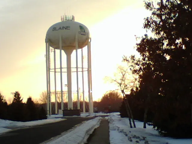 A water tower in Blaine, USA just before a winter sunset. The city pumps its drinking water from wells, and stores them into towers like this one, which is located in the Blaine Baseball Complex Park at the intersection