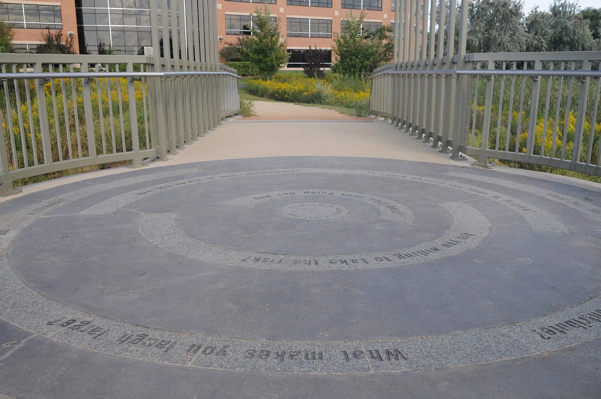 This bridge was built as a memorial to the late Mayor Jean Harris. It connects to pieces of land within the Purgatory Creek Park in Eden Prairie, Minnesota..