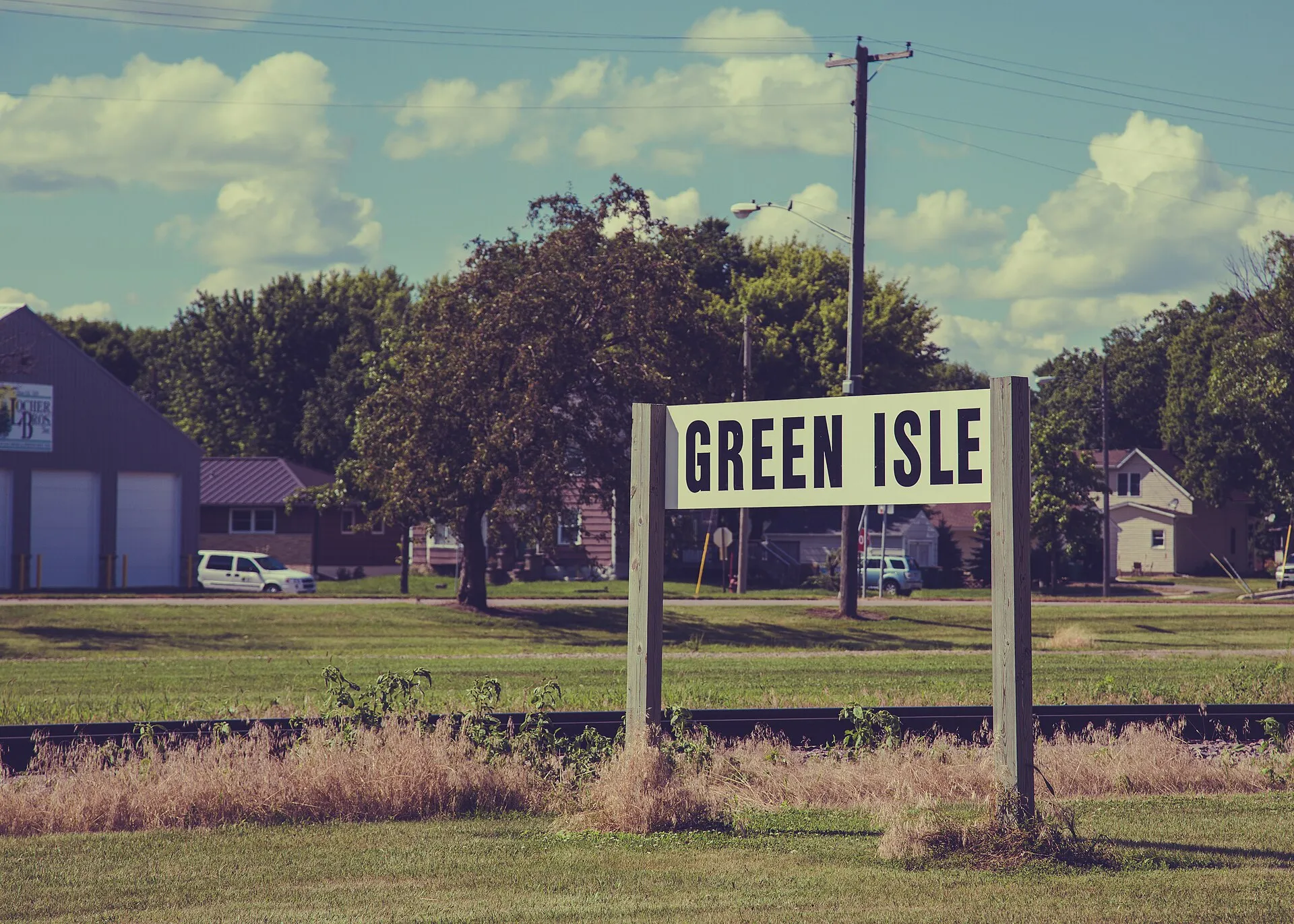 A sign along the railroad in Green Isle, Minnesota.