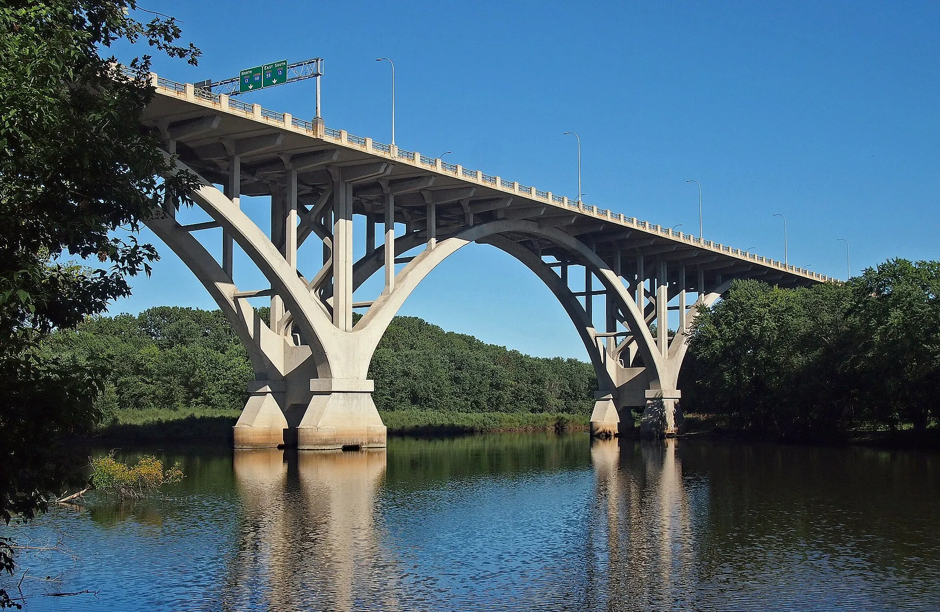The Mendota Bridge over the original channel of the Minnesota River, viewed from the west on the Minnesota River State Trail within Fort Snelling State Park, Mi
