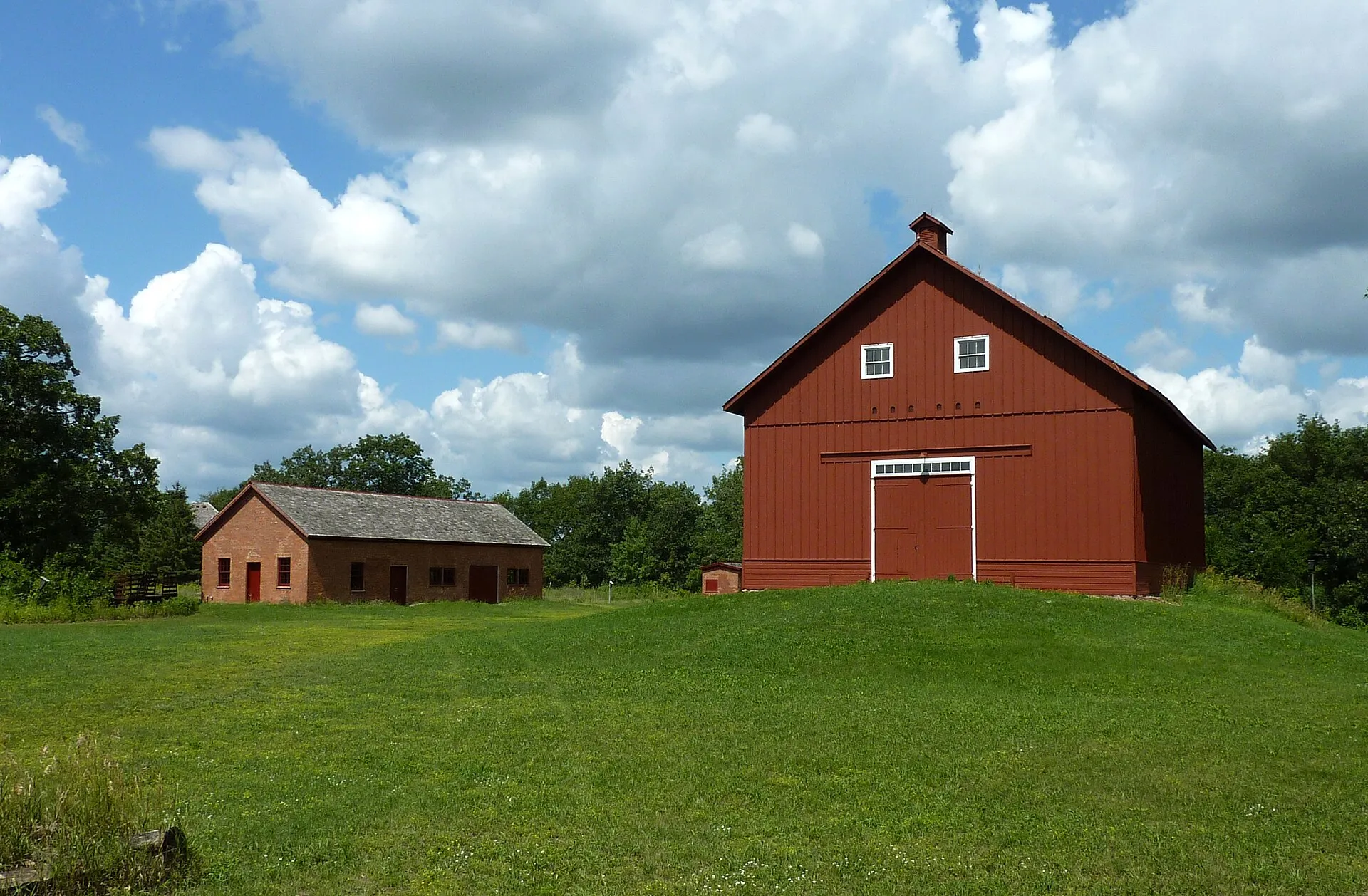 View of James J. Hill's North Oaks Farm, including the barn-shaped granary and Blacksmith Shop and Machine Shop , North Oaks, Minnesota , USA..