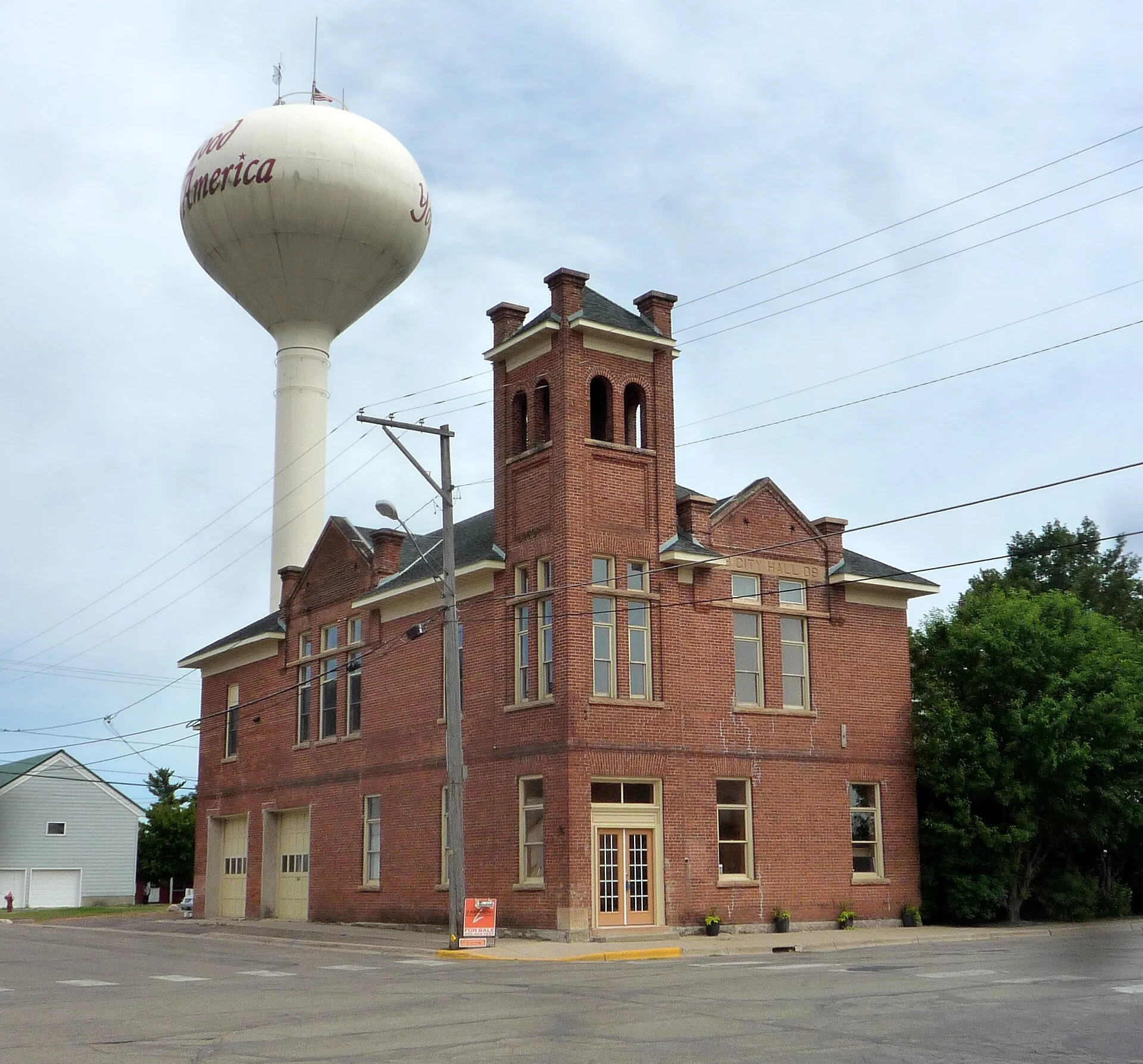 Young America City Hall (NRHP), now offered as a private home/business (it even has a pool), Norwood Young America, Minnesota, USA.