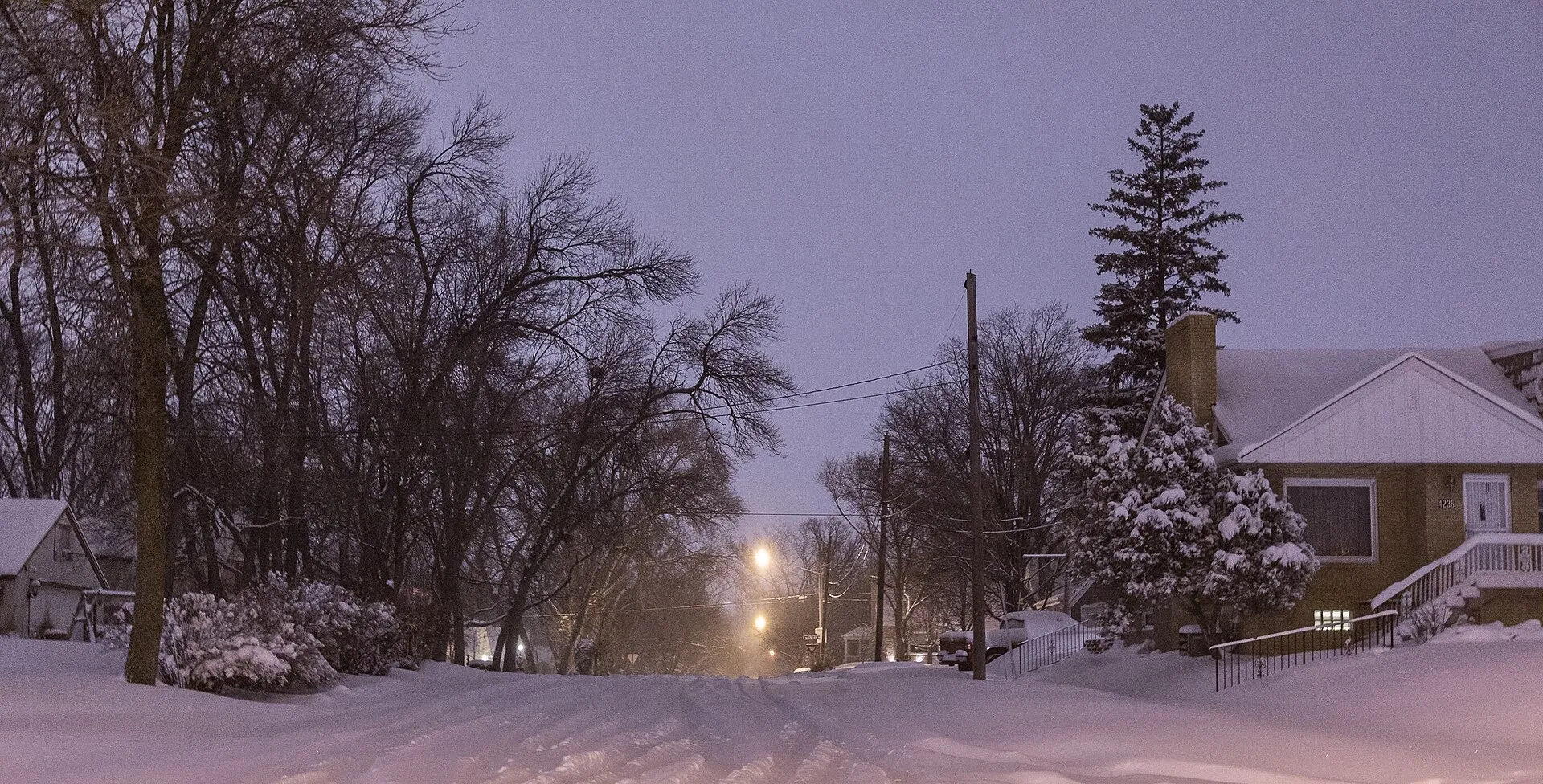 A snowy night near France Avenue North and Shoreline Drive in Robbinsdale, Minnesota.