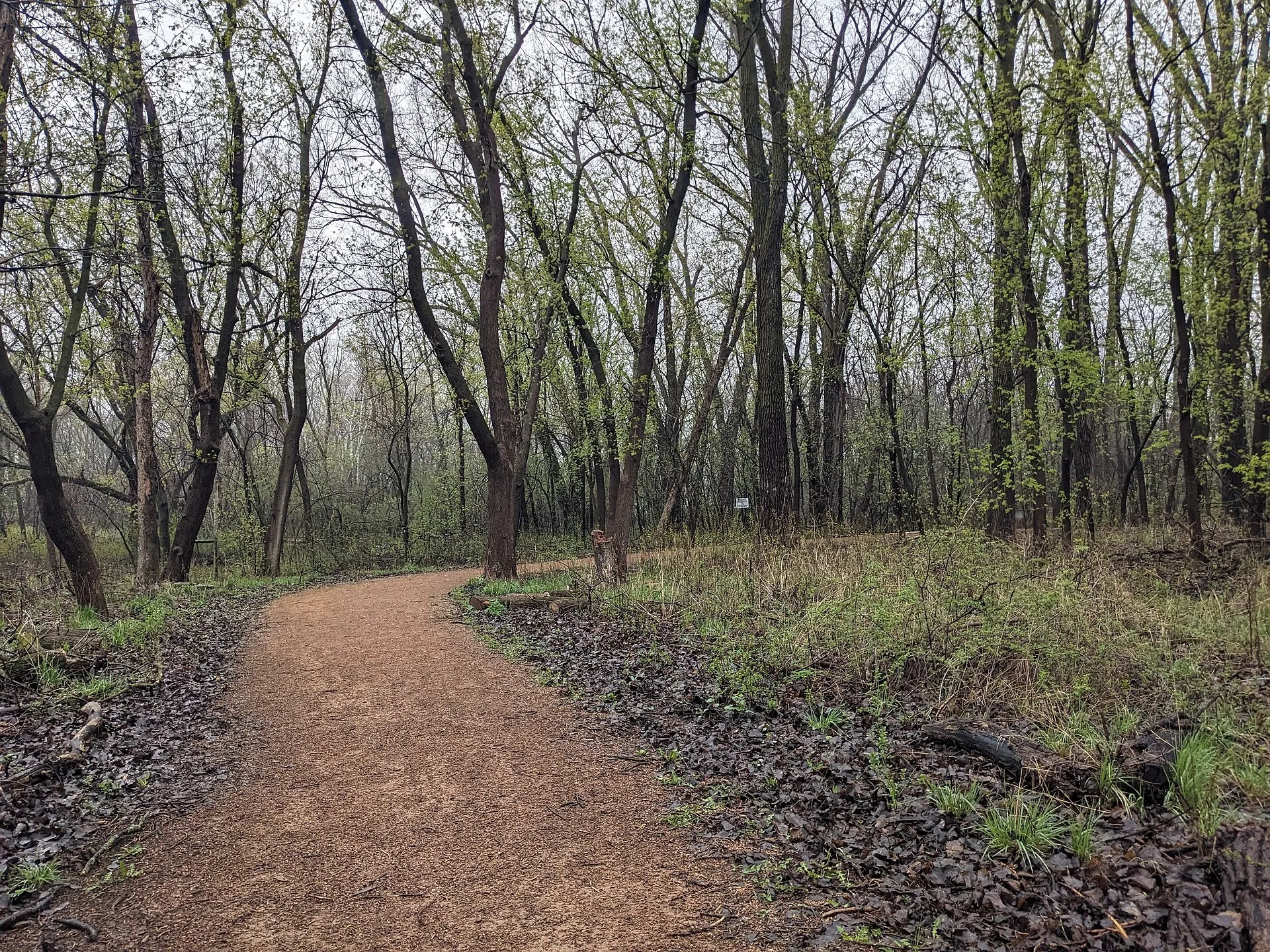 Walking path in Cottontail Park on a cloudy spring day..