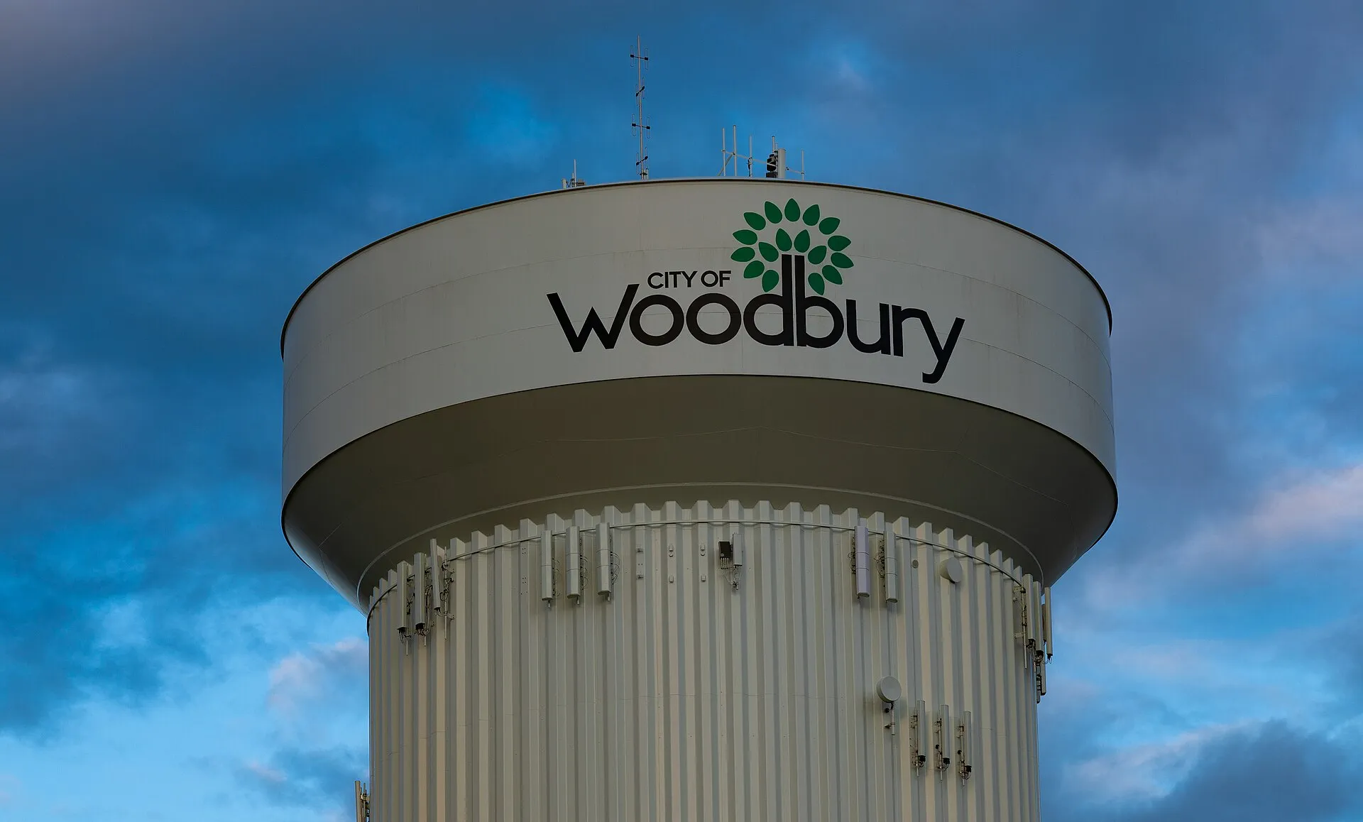 A water tower in the City of Woodbury, Minnesota, at sunset..