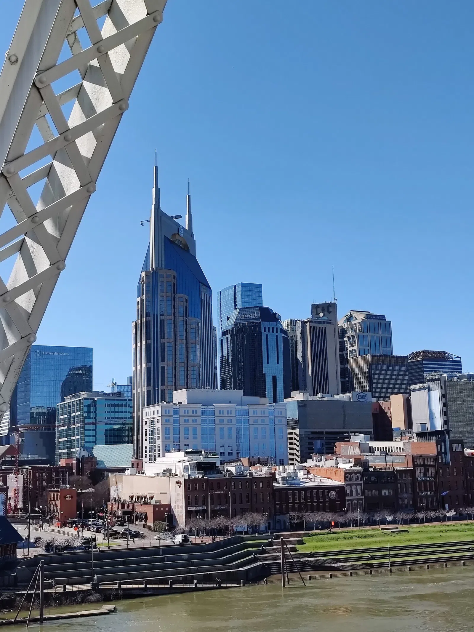 Downtown Nashville skyline seen from the John Siegenthaler pedestrian bridge across the Cumberland River.