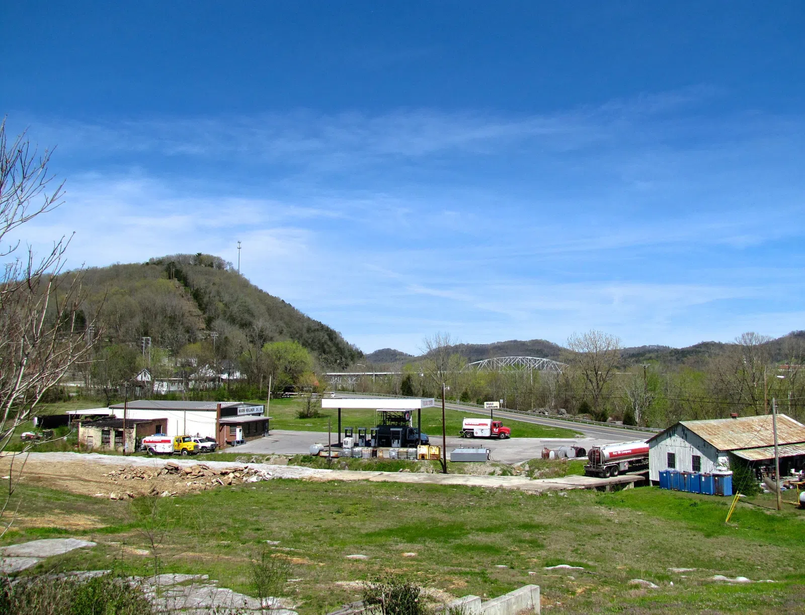 Businesses along U.S. Route 70N in South Carthage, Tennessee, United State. The Cordell Hull Bridge is visible in the background.