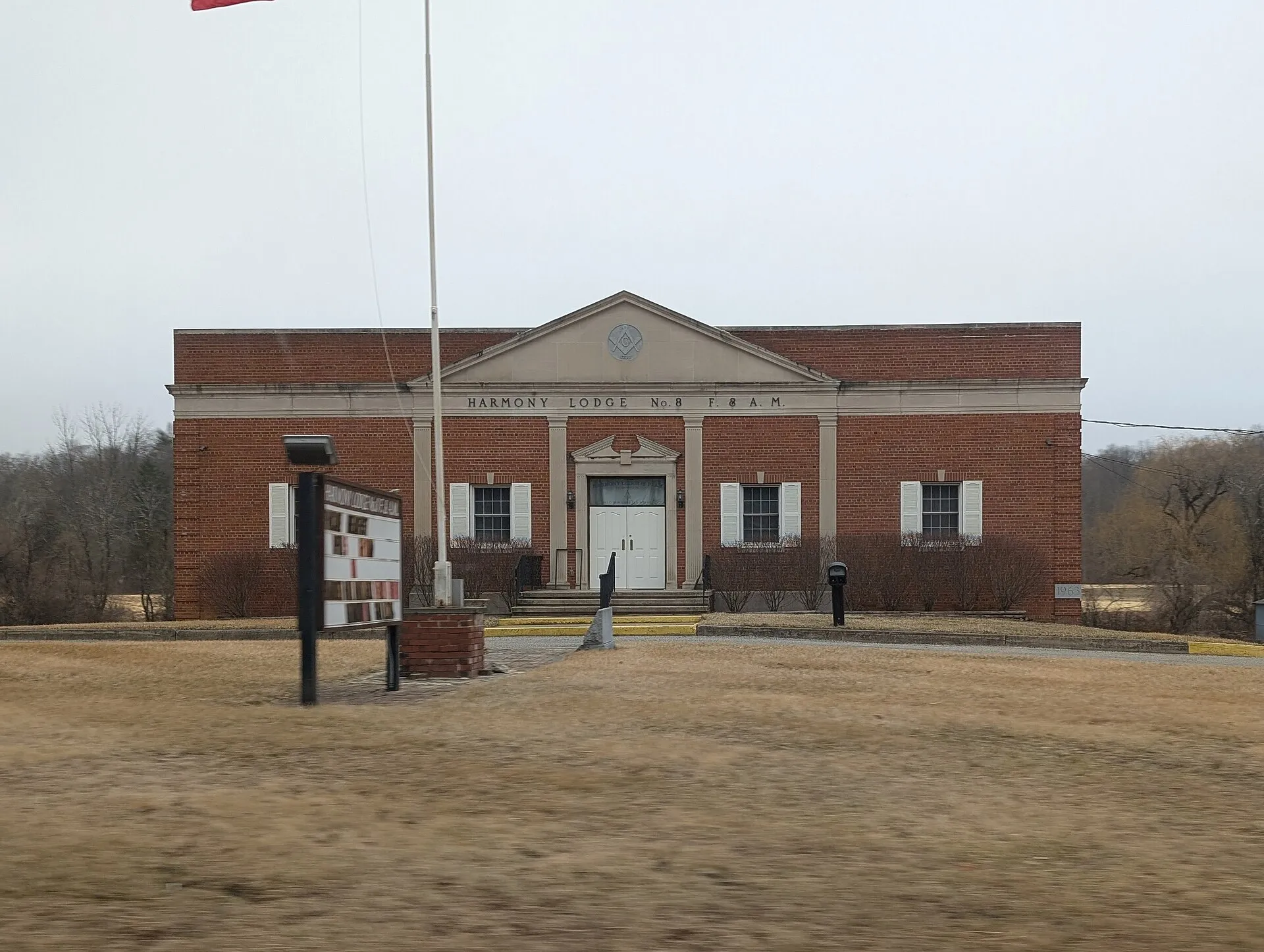 Harmony Lodge No. 9, a Masonic building, in Andover Township, New Jersey, from U.S. Route 206 (March 2025)