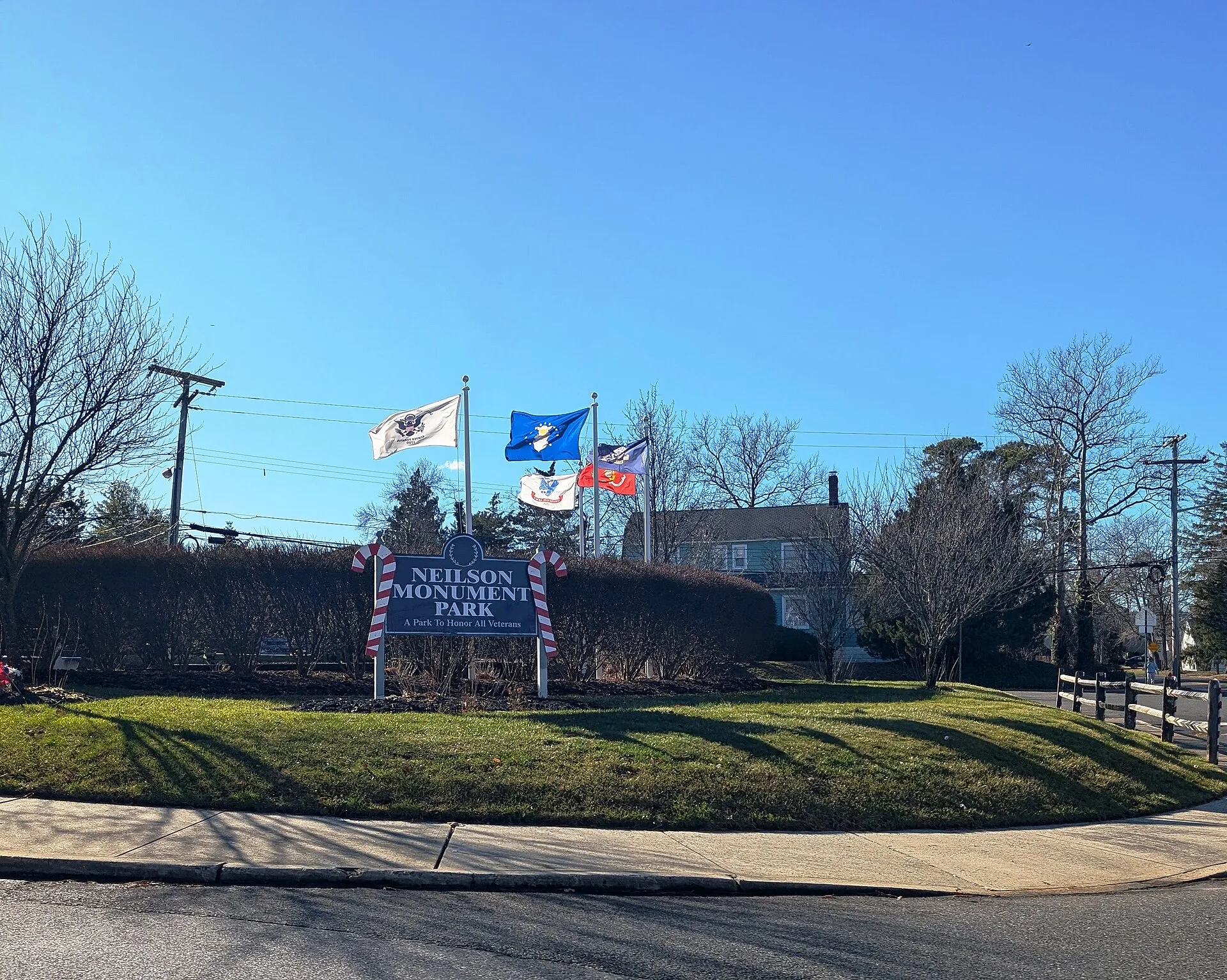 Photo of Neilson Monument Park in Beachwood, New Jersey. Photo taken from County Route 617 (Compass Avenue) at Beachwood Boulevard looking south