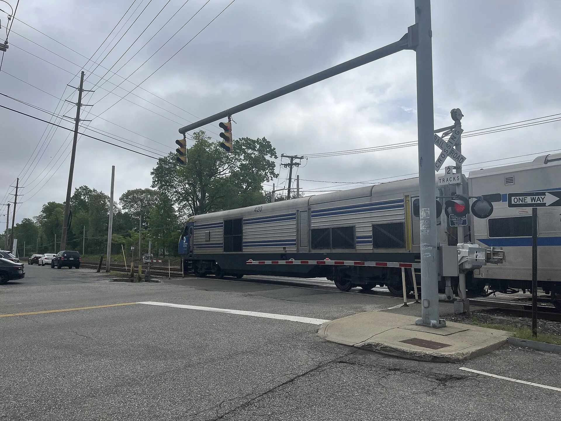 An LIRR train passing through Brightwaters (May 2025)