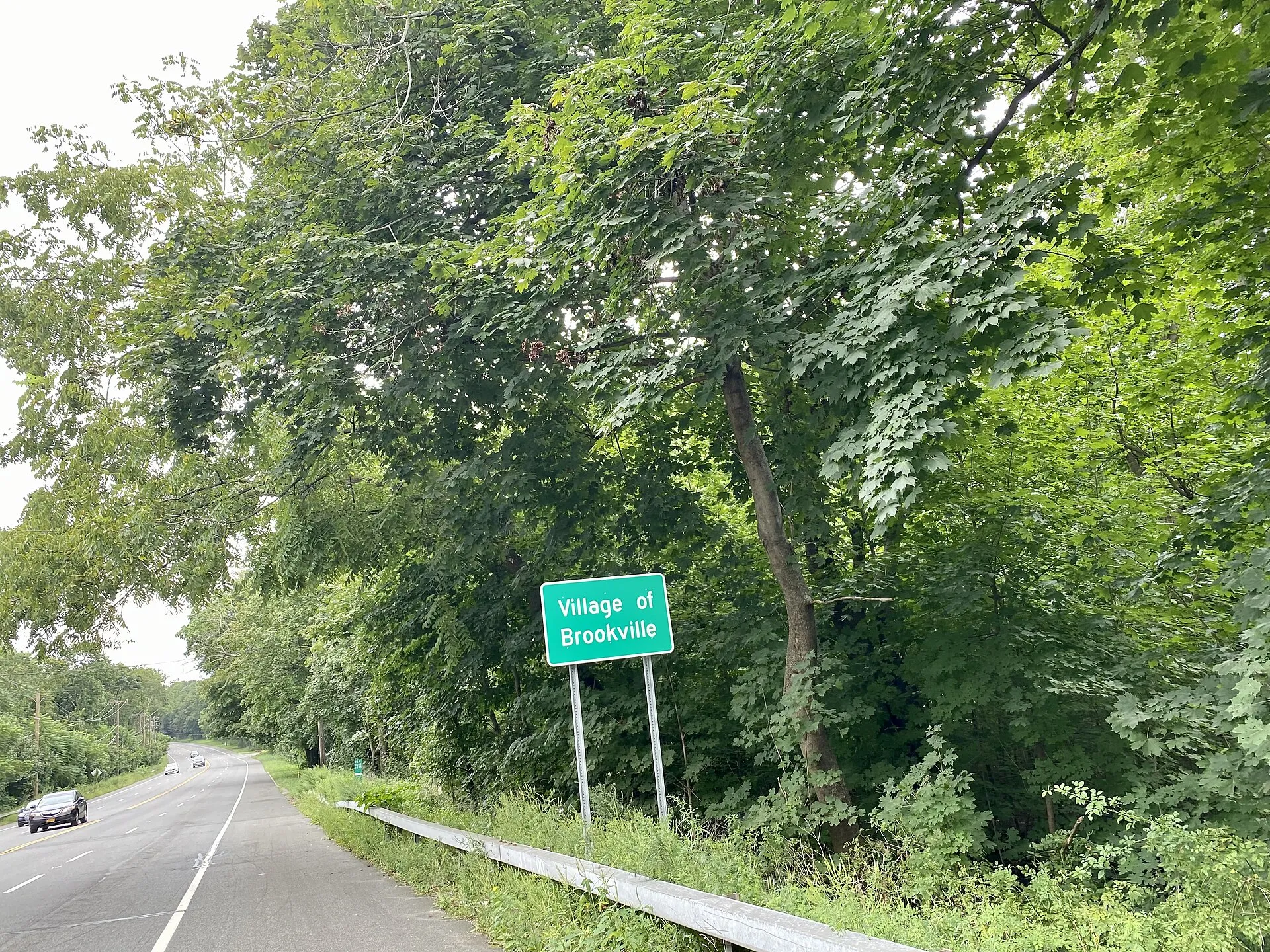 A welcome sign at the entrance to Brookville, Long Island, New York on August 29, 2021. This sign is located on NY 25A
