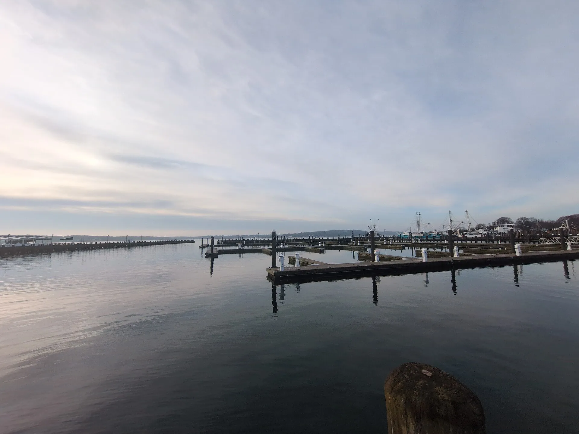 View of Greenport Harbor and Peconic bay from Mitchell Park featuring the Shelter Island ferry