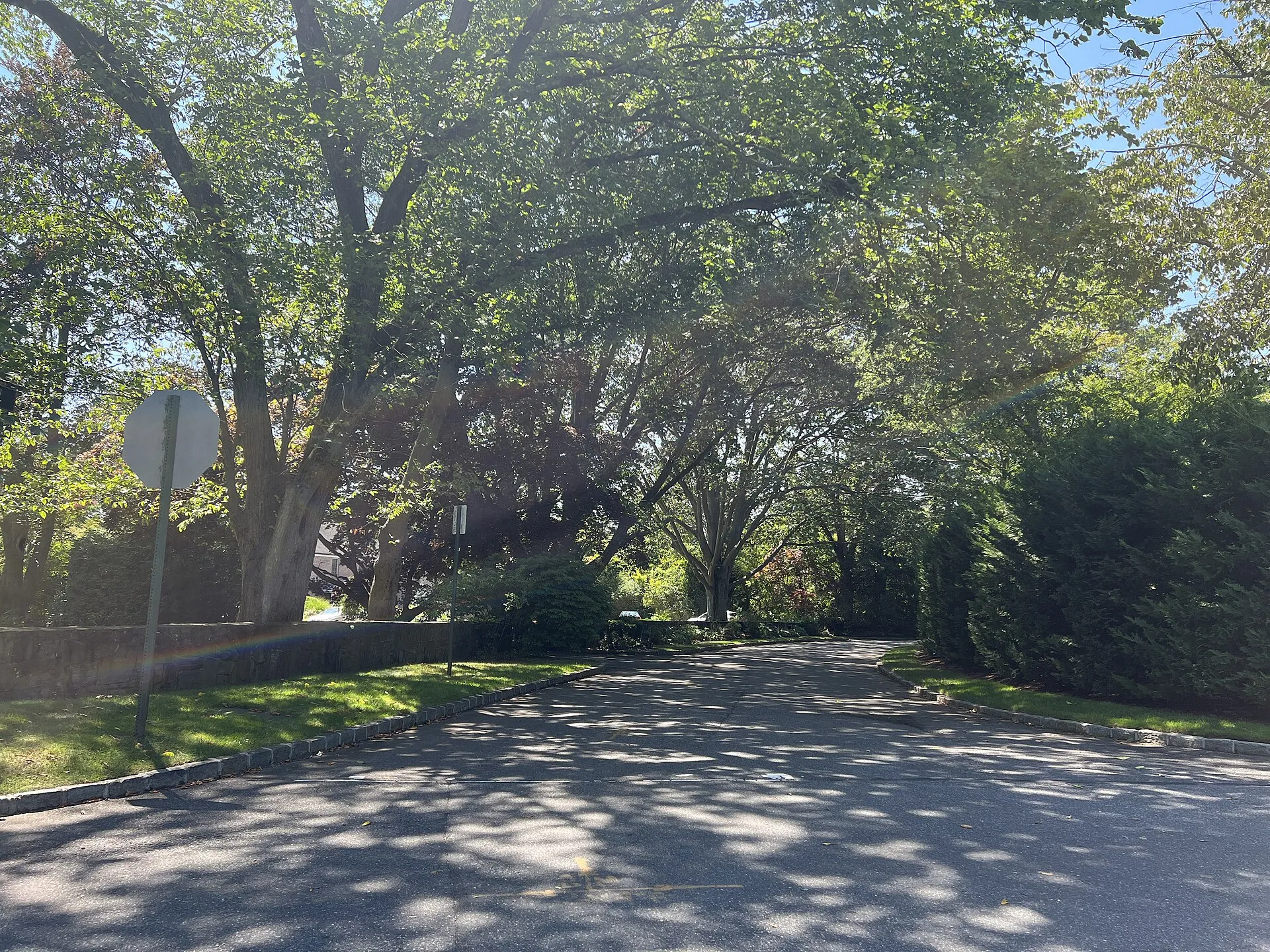 Albon Road in the Inc. Village of Hewlett Harbor, NY on August 8, 2022, as seen from its intersection with Harbor Road