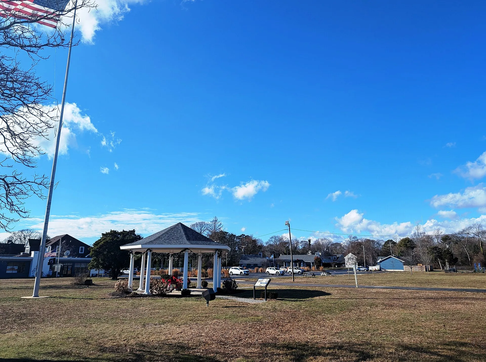 Photo of a gazebo and flagpole at Wanamaker Field in Island Heights, New Jersey. Photo taken looking southwest