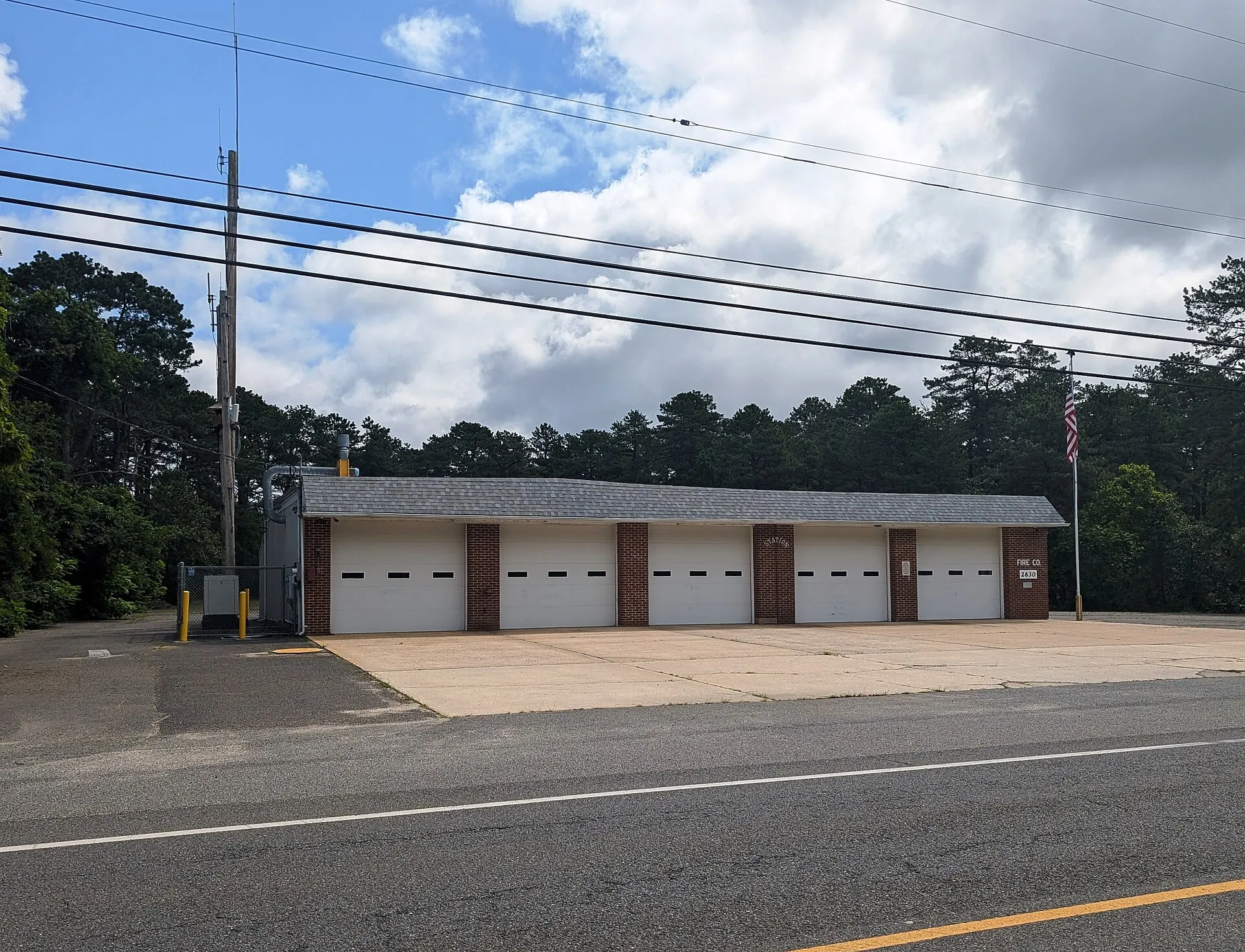 Photo of the Bamber Lake Fire Company in the community of Bamber Lake within Lacey Township, New Jersey. Photo taken from County Route 614 (Lacey Road) looking east