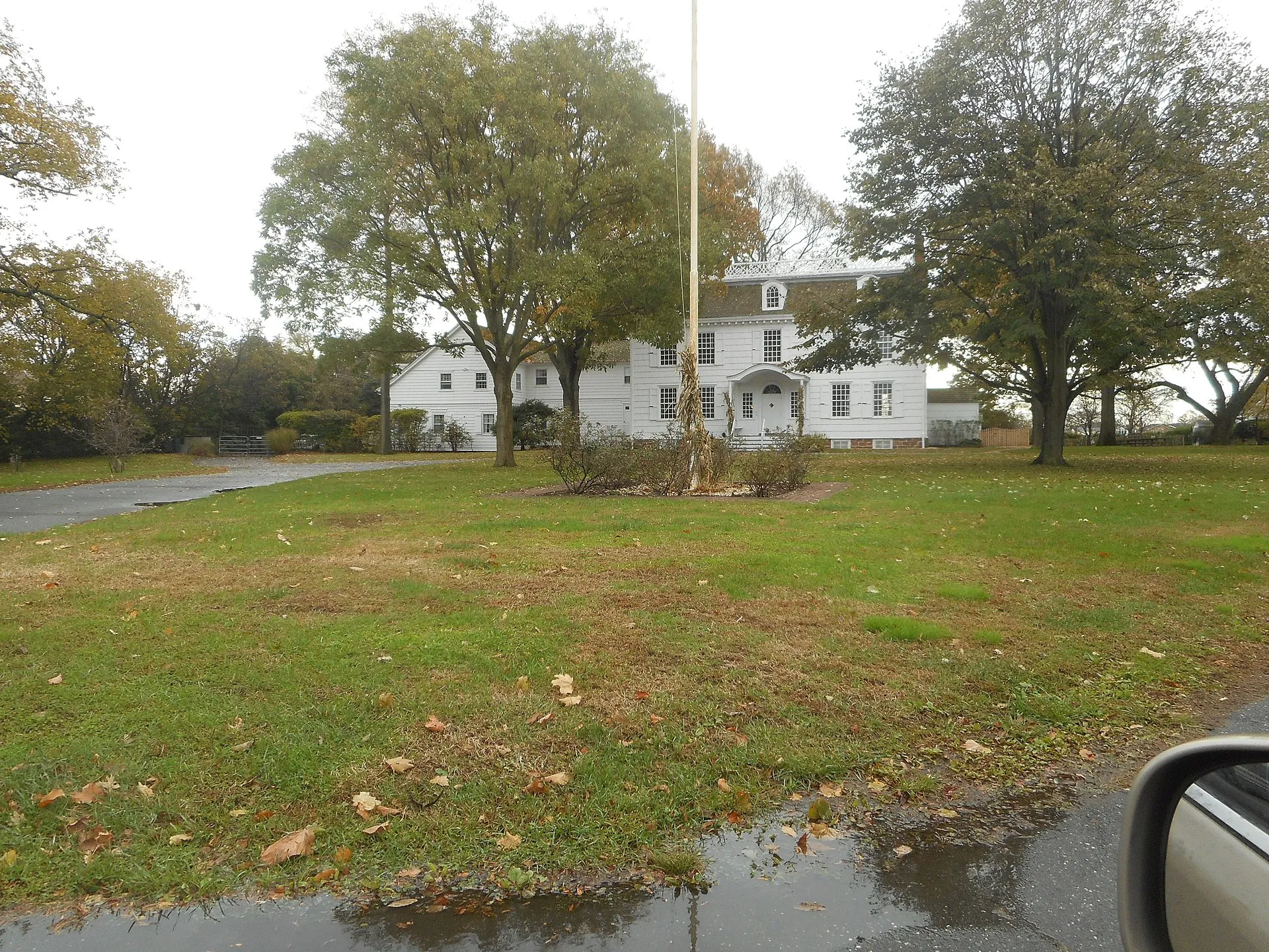 Contemporary photographs of the NRHP-listed Rock Hall in Lawrence, New York. The house was built on the northeast coast of Jamaica Bay around 1767, and was once the home of English sugar