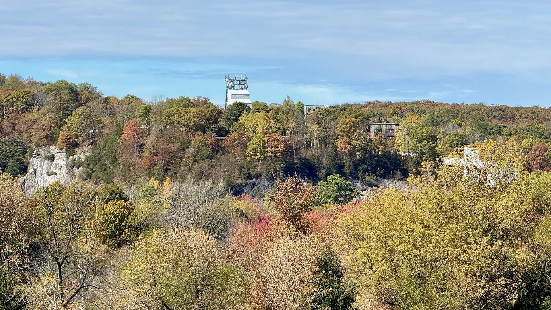 Area view of the Sterling Hill Mining Museum, Ogdensburg, NJ — open-pit mine at left, conveyor building at right
