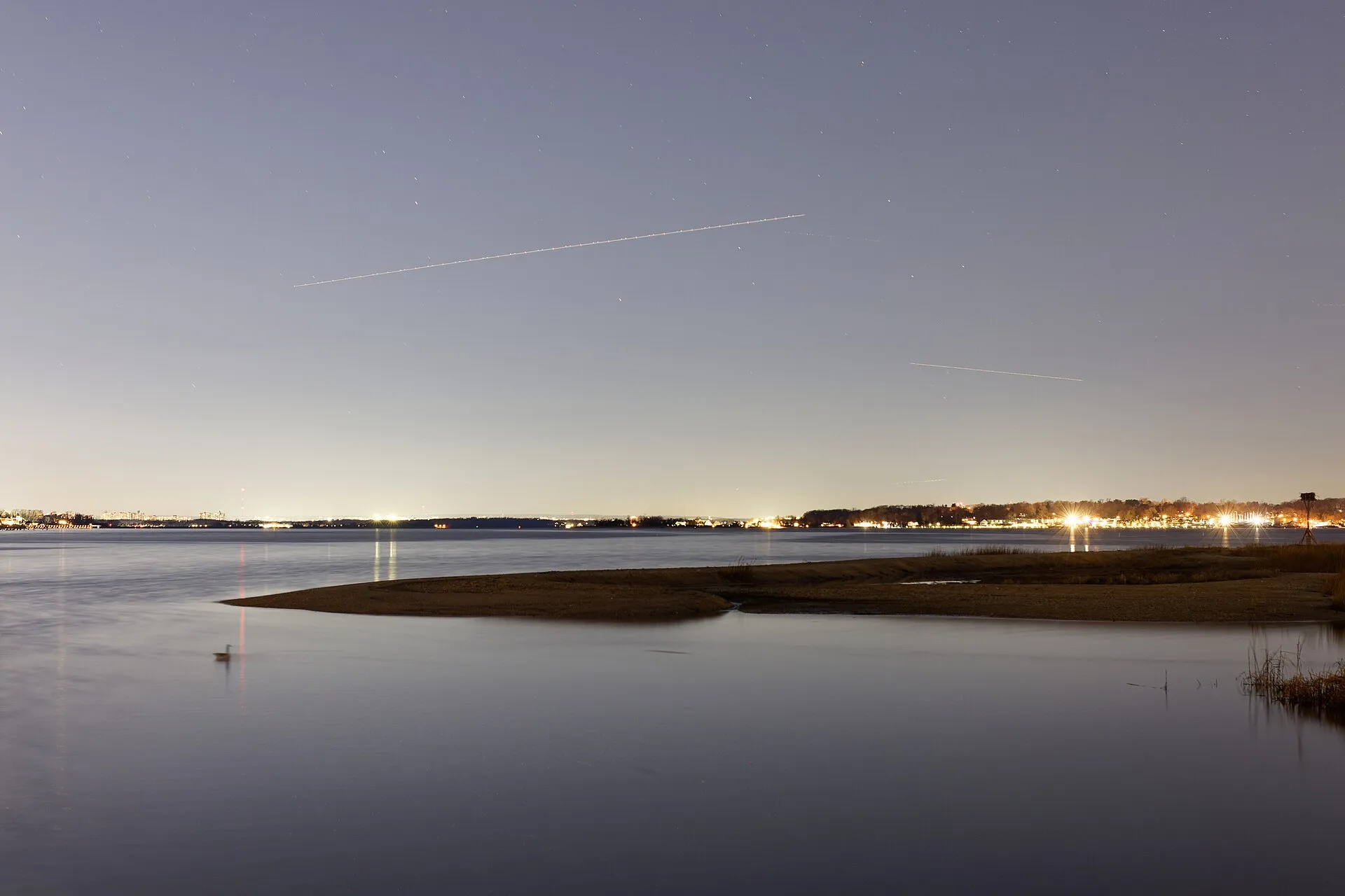 Long-exposure view of Manhasset Bay facing north from North Plandome Road, across from Leeds Pond, January 2024