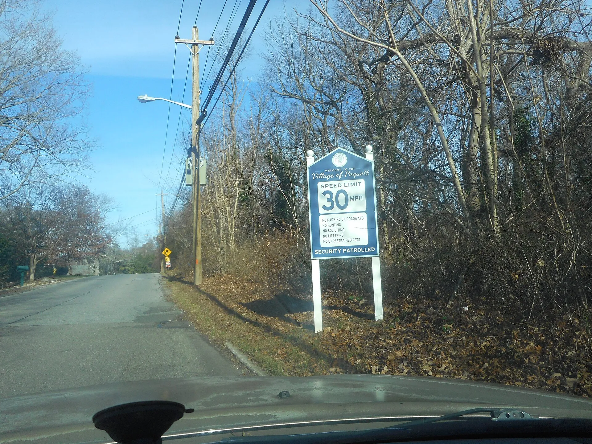 First shot of a very non-MUTCD compliant speed limit sign combined with local restrictions sign along Washington Street just north of