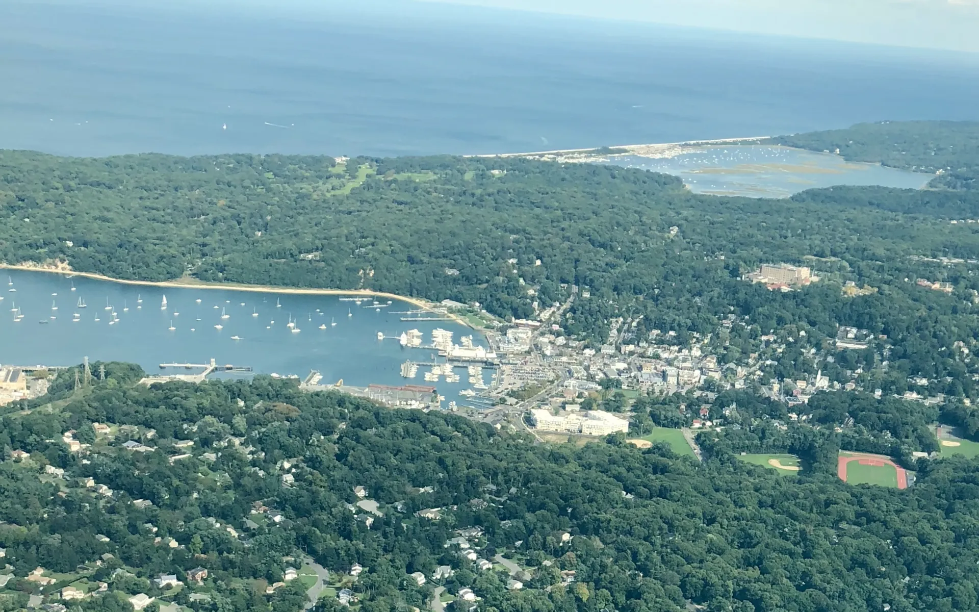 Aerial View of the Inc. Village of Port Jefferson, NY and its surroundings on October 14, 2018, looking east. The downtown section of