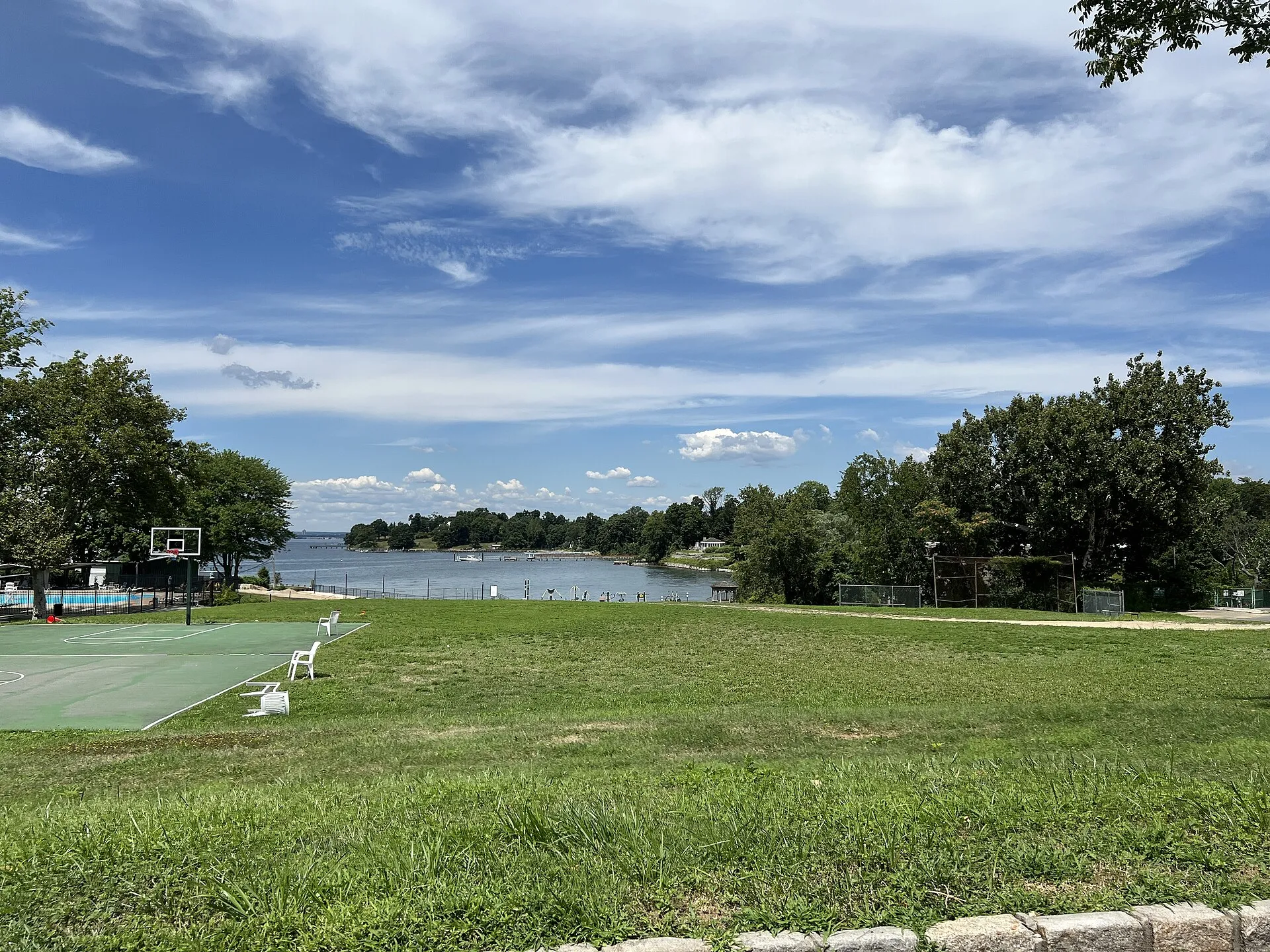 The view from Grist Mill Lane in front of the Saddle Rock Village Park, August 2022
