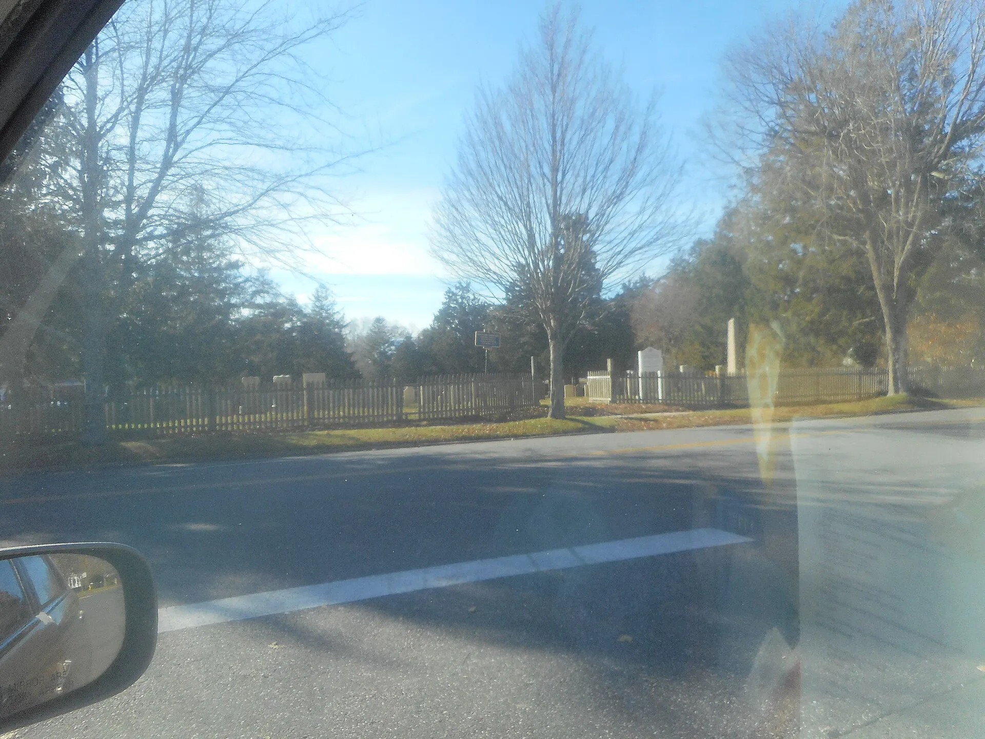 The historic North End Burying Ground along North Sea Road and Main Street as seen from the intersection with North Main Street in the