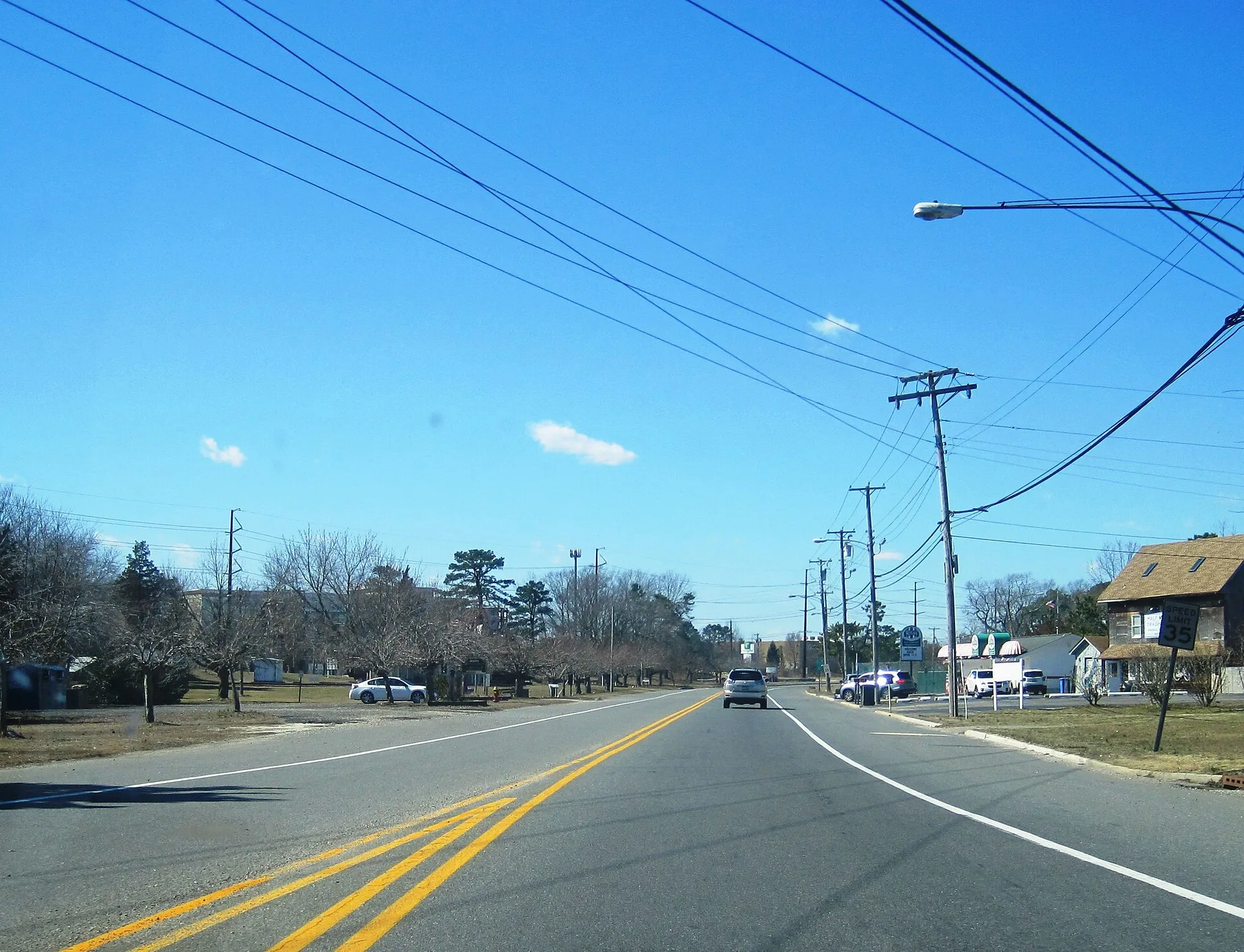 Photo looking west approaching the western end of Bay Avenue in Stafford Township, New Jersey. This was previously the mainline of New Jersey Route 72 (seen in the far background) prior to the 1960s