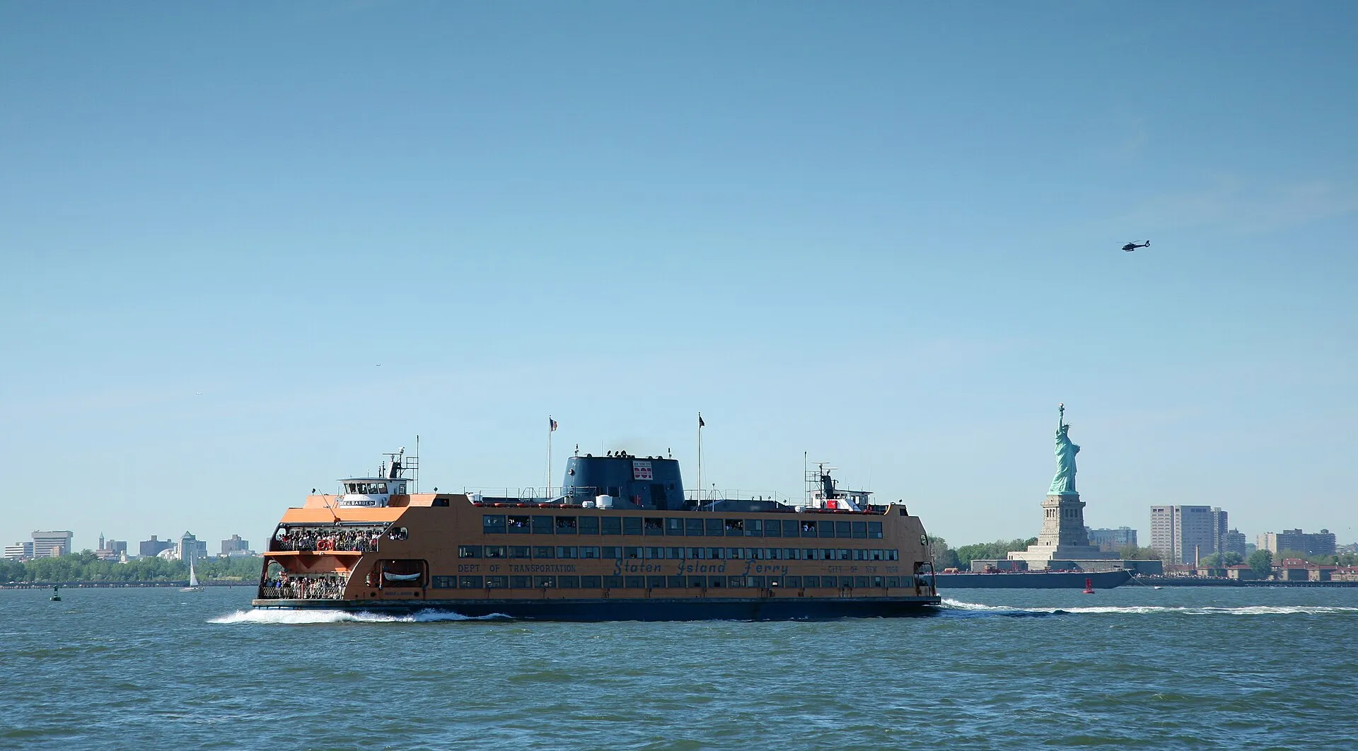 Staten Island Ferry (the Andrew J. Barberi) with the Statue of Liberty in the background