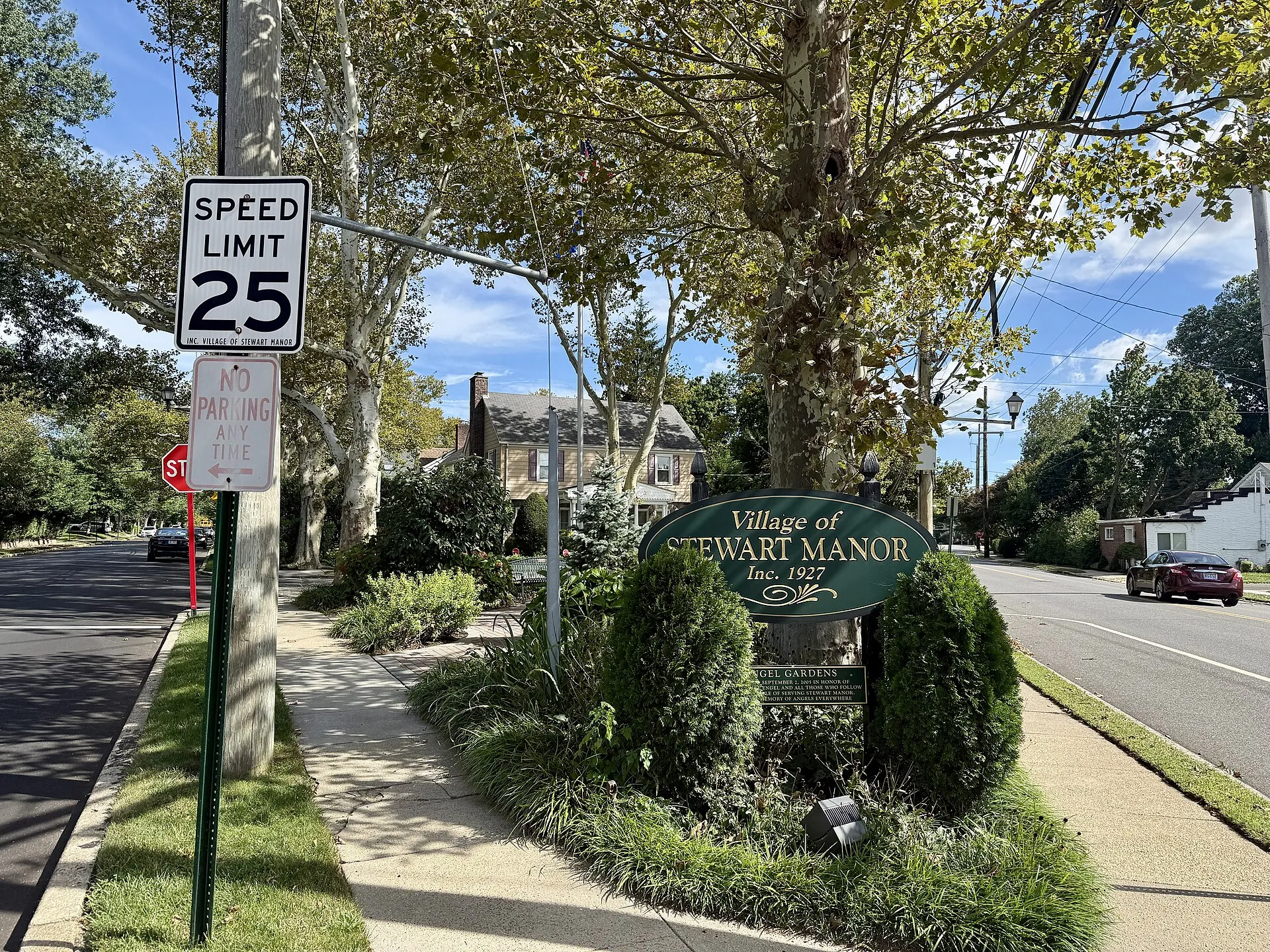 Stewart Manor welcome sign at the Angel Gardens memorial plaza, September 2026