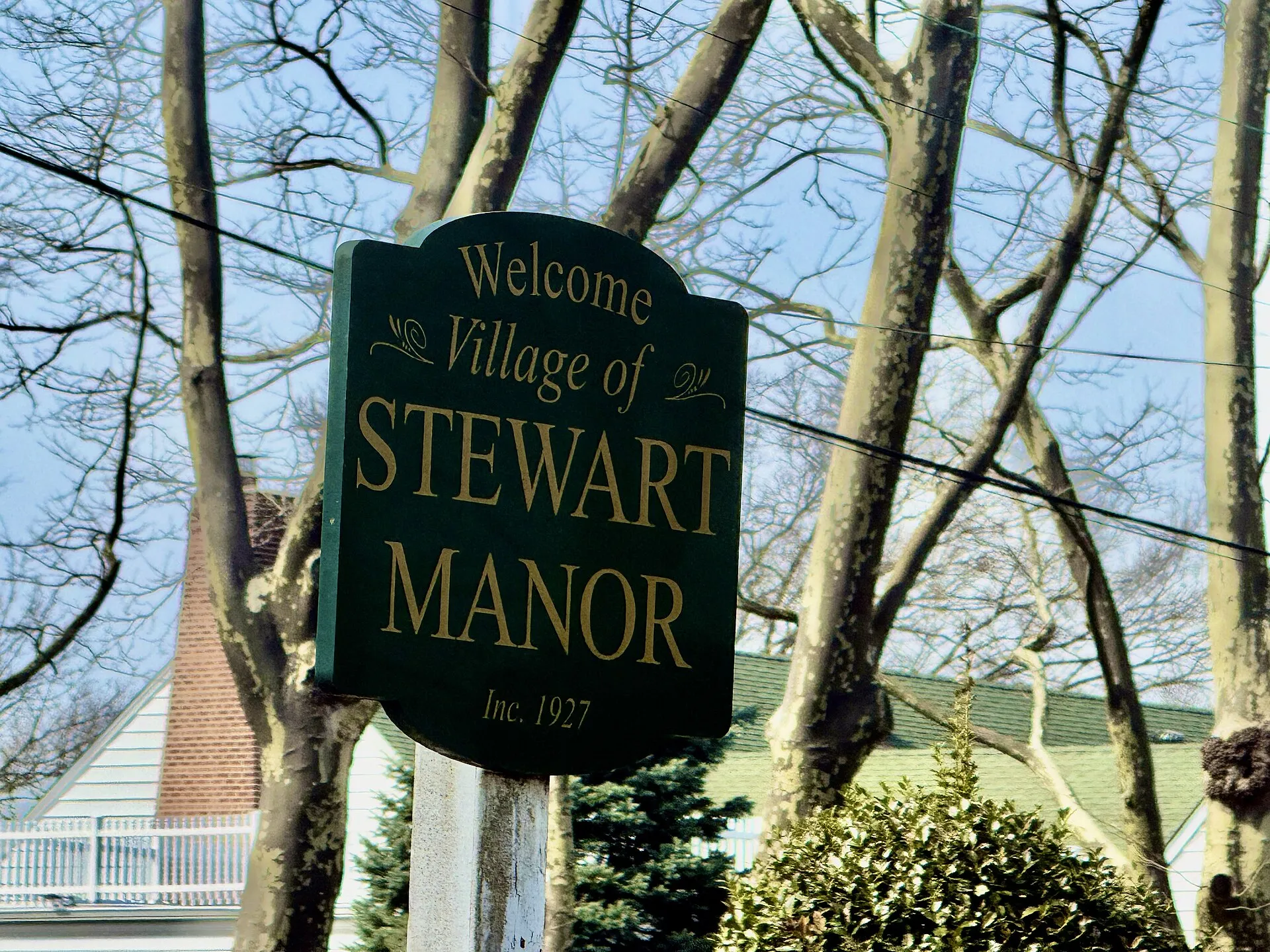 Village entrance sign at the Stewart Manor–Garden City border along Salisbury Avenue, March 2026
